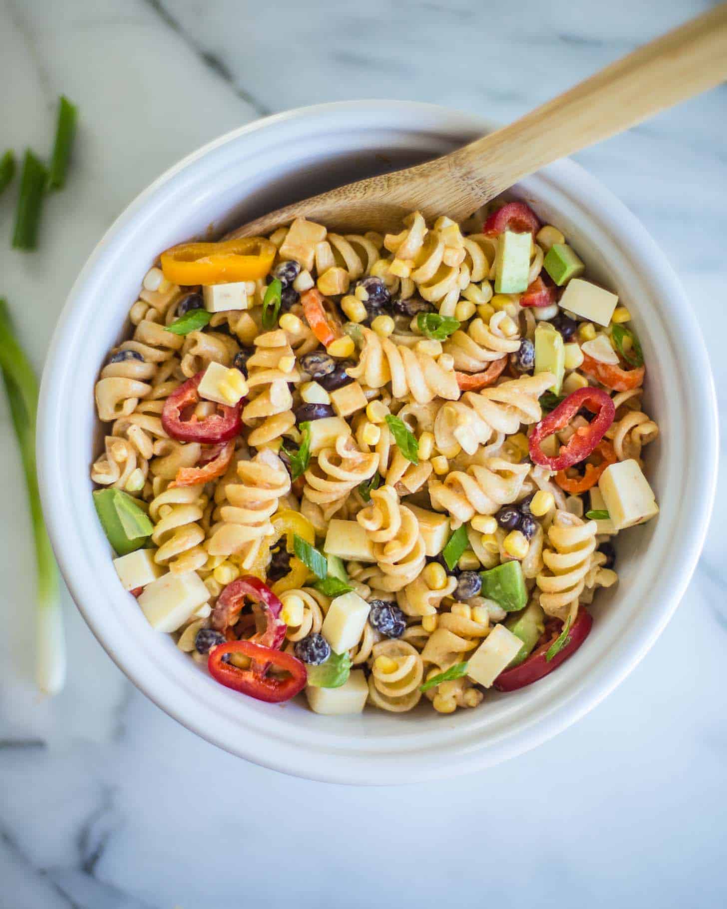 pasta salad in a white bowl