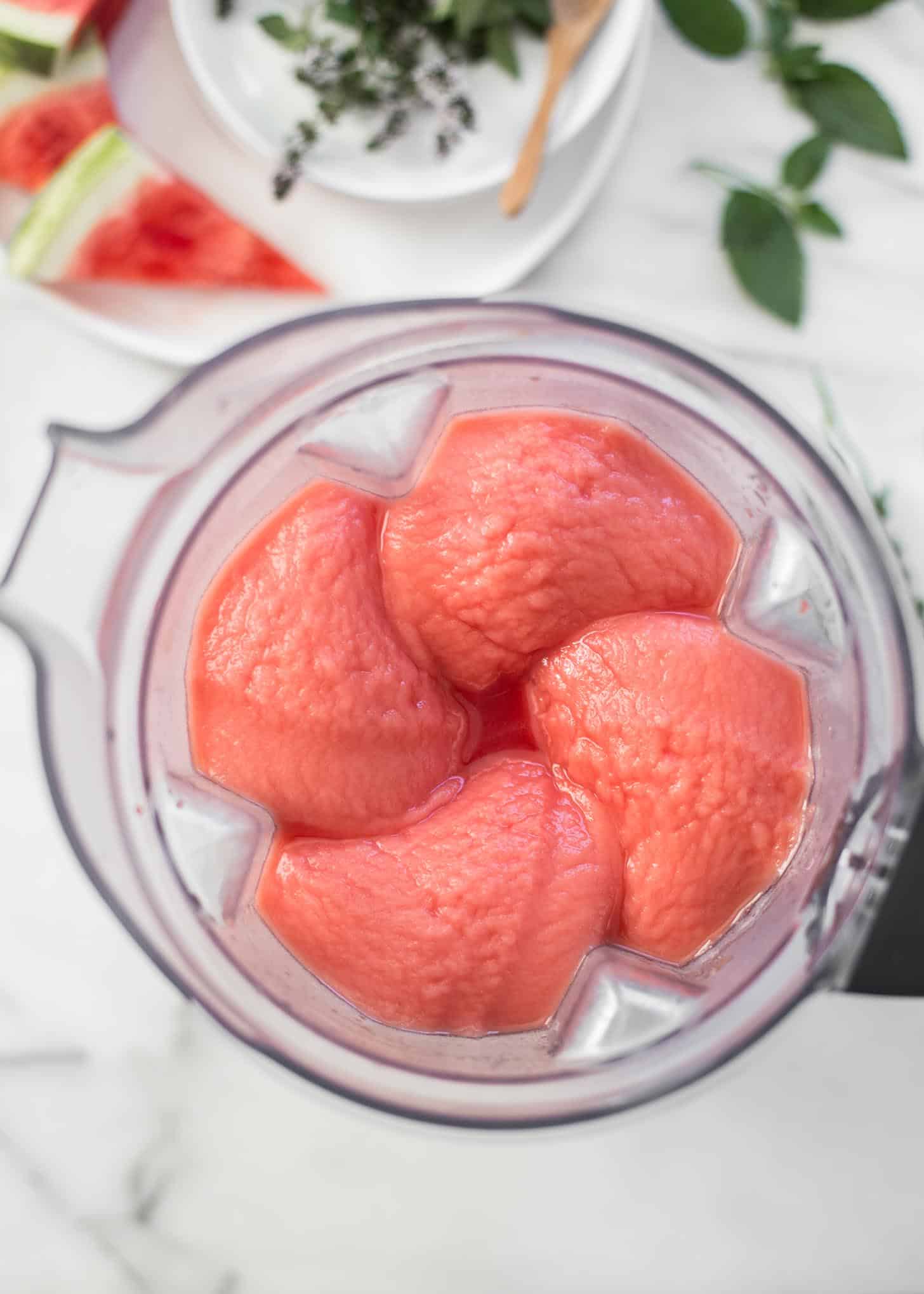 overhead image of watermelon frose in a blender