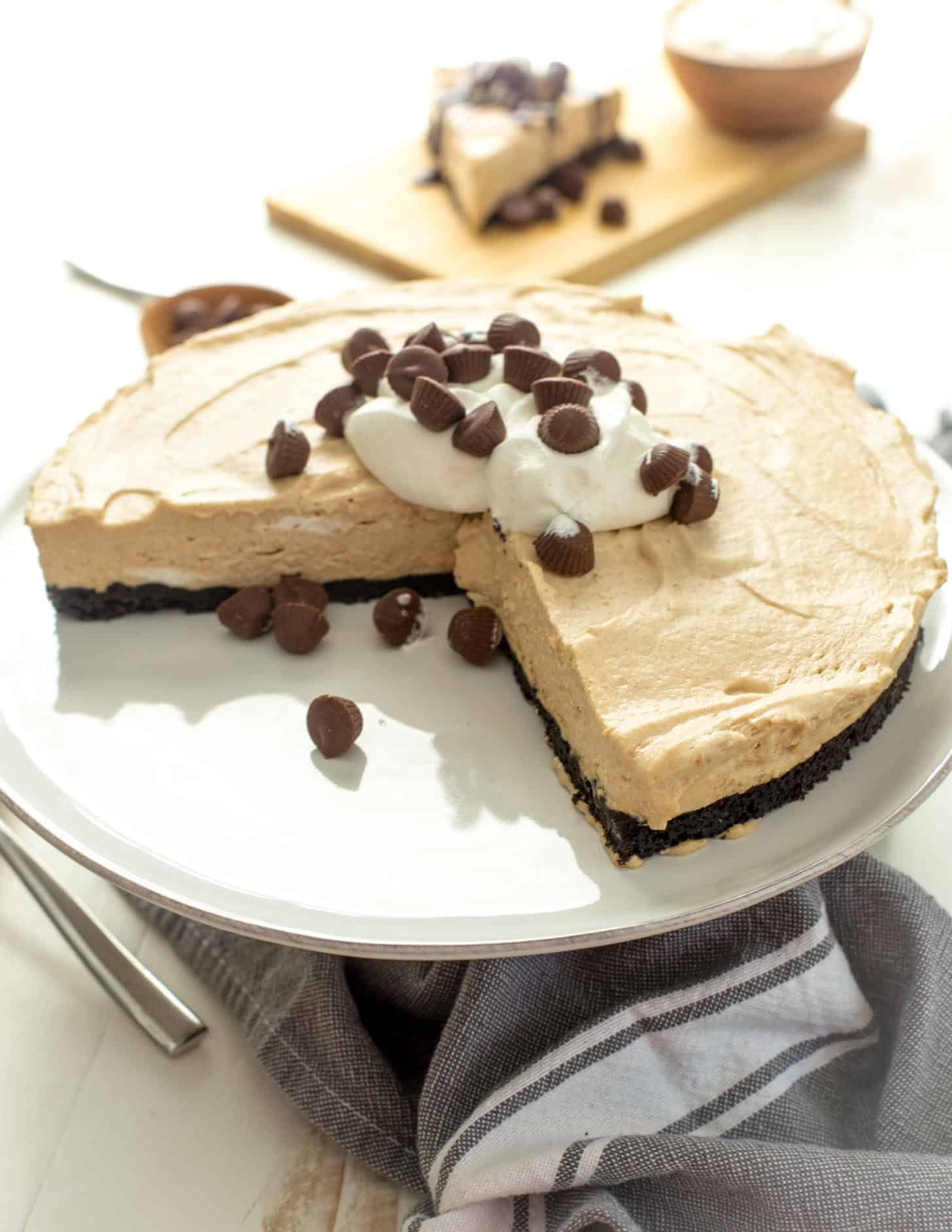 Frozen Peanut Butter Cheesecake Pie with a few slices removed