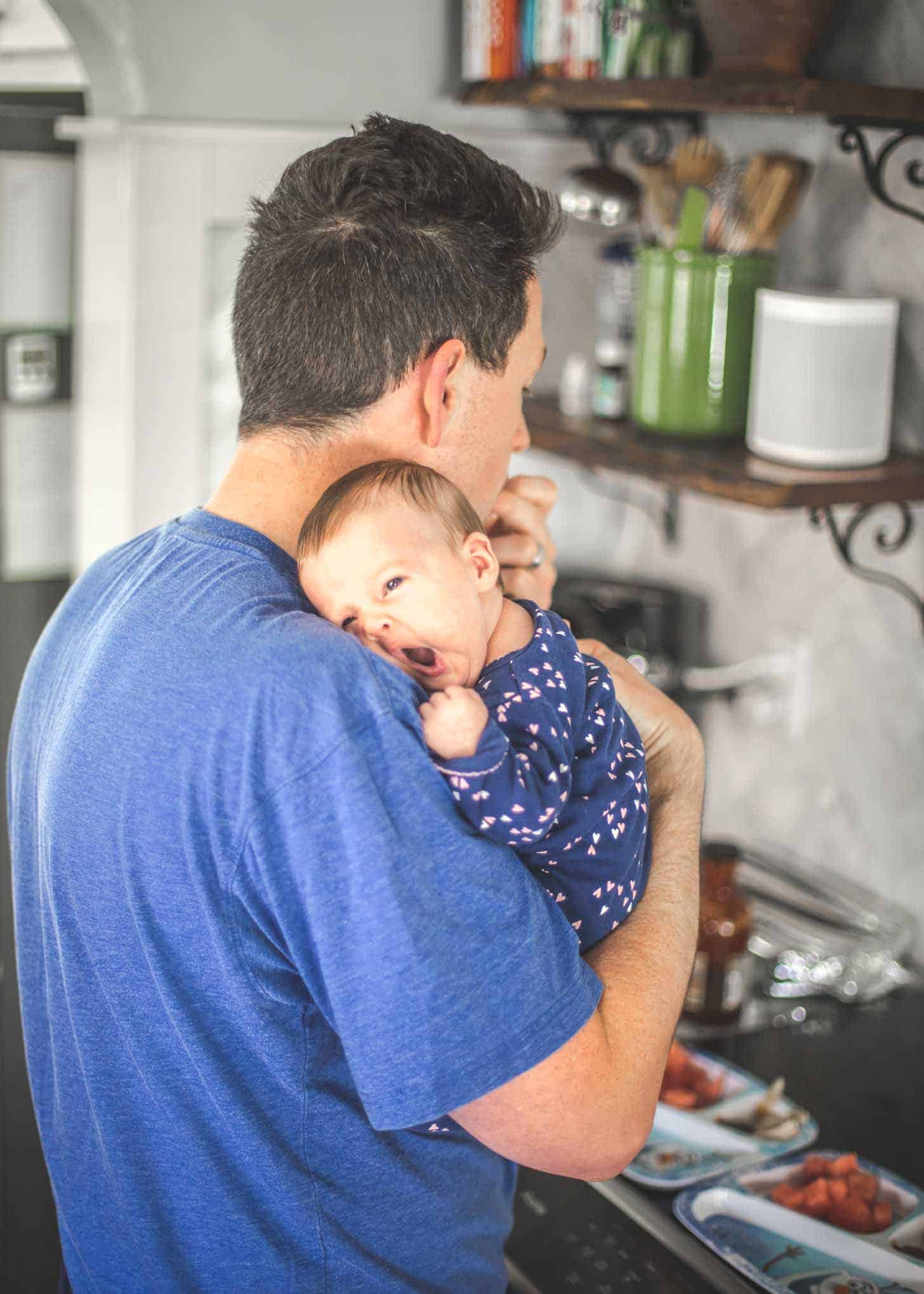 Frank holding baby June