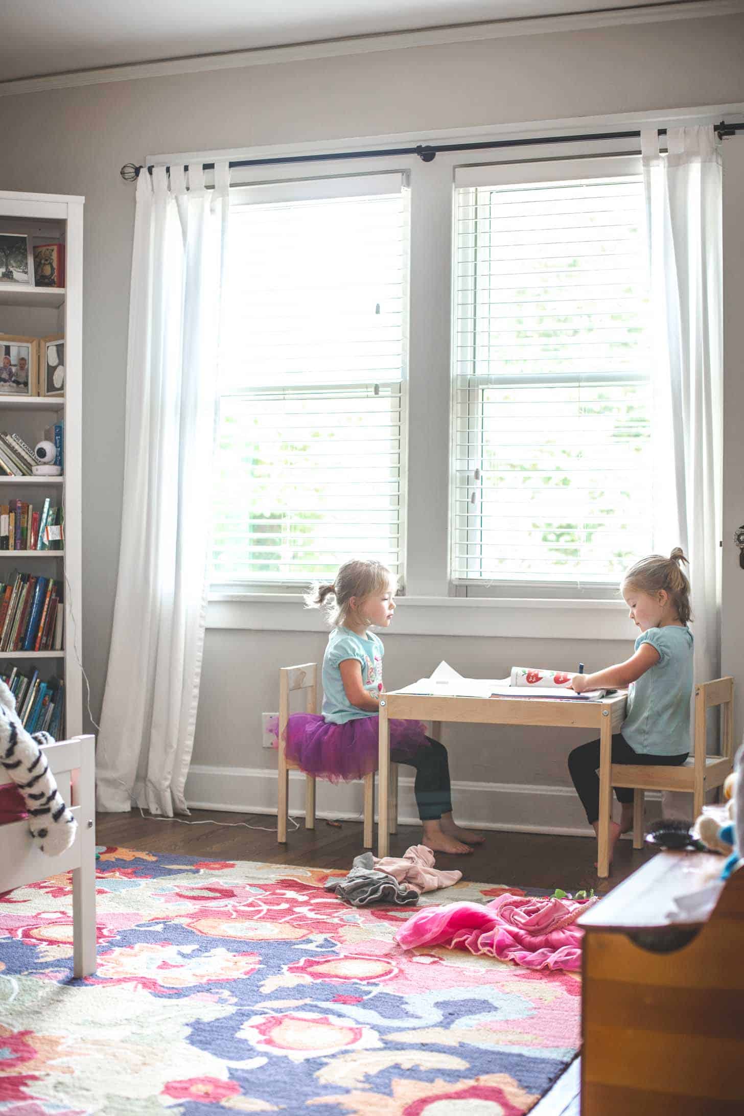 two little girls coloring