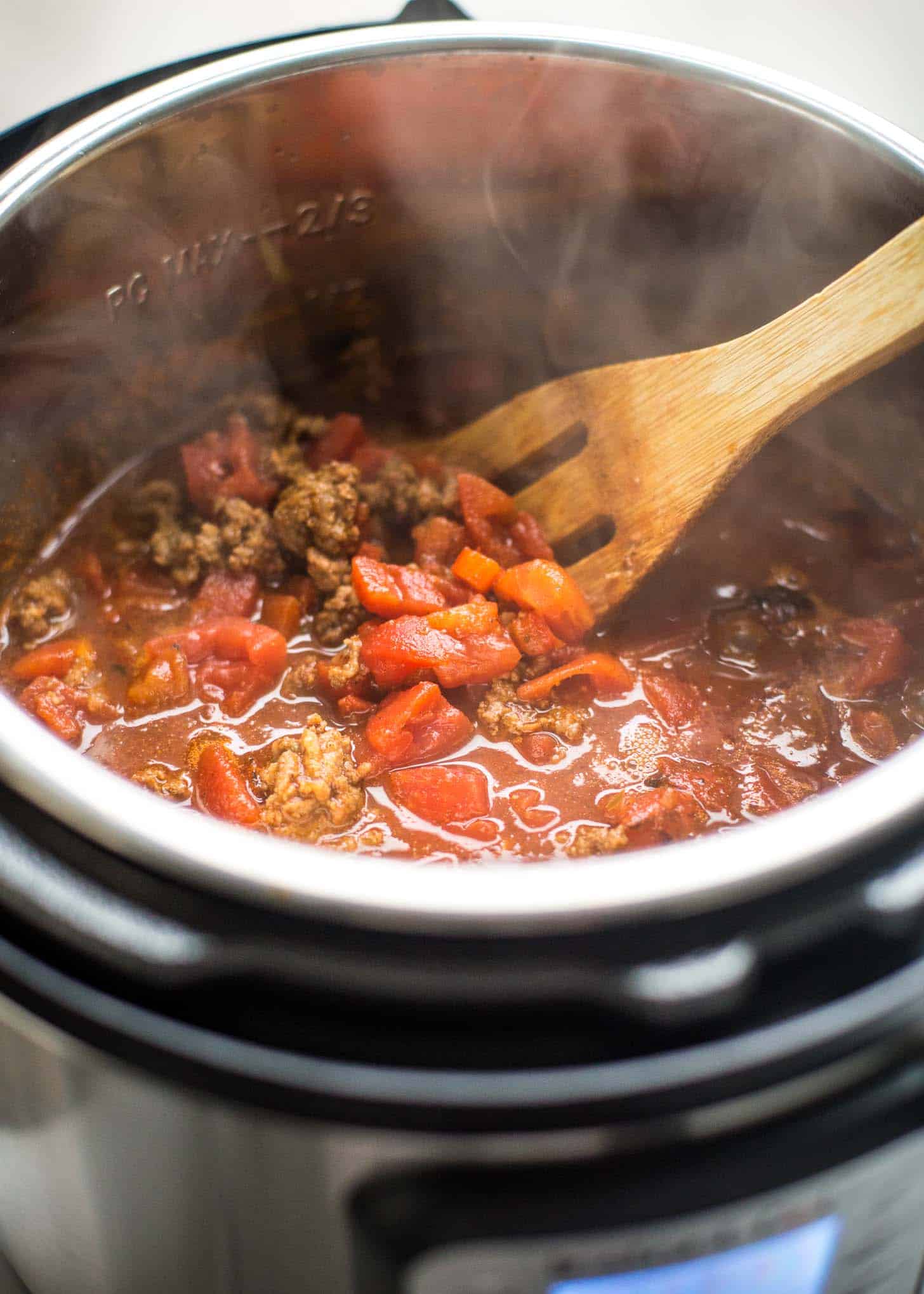 stirring chili in the instant pot