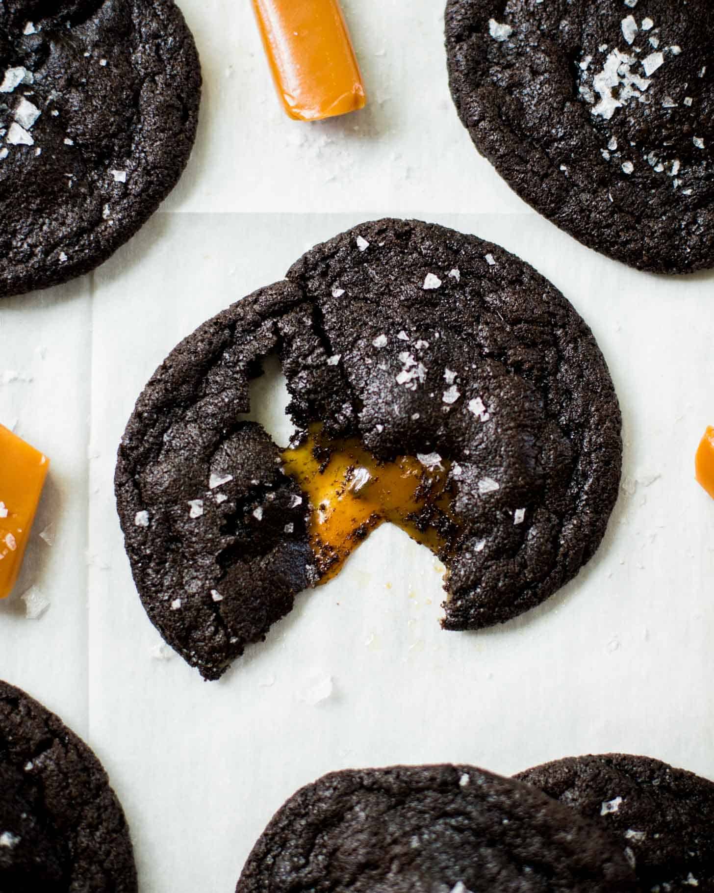 Salted Caramel Stuffed Chocolate Cookies on a white table