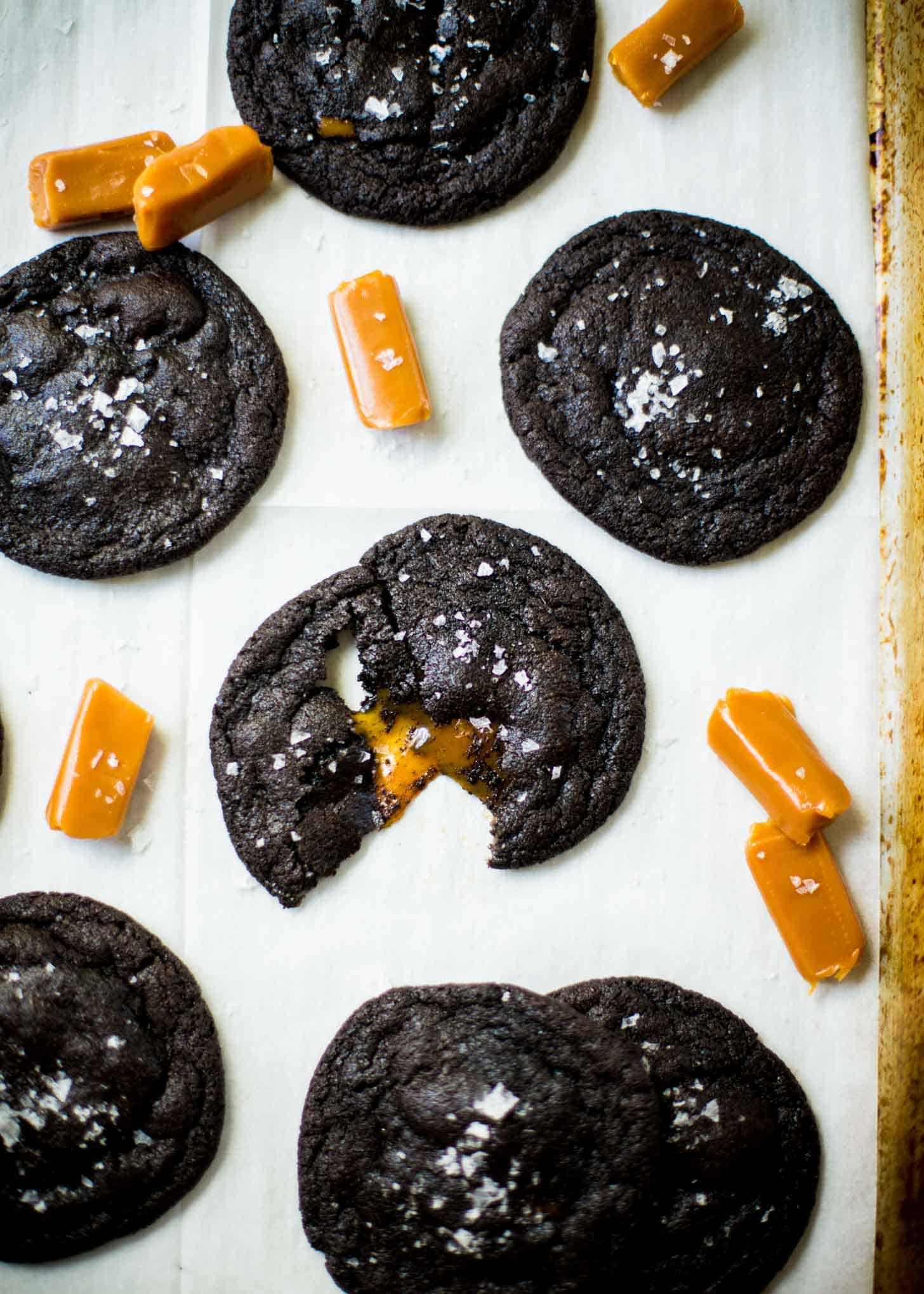 overhead image of cookies and caramel on a sheet pan