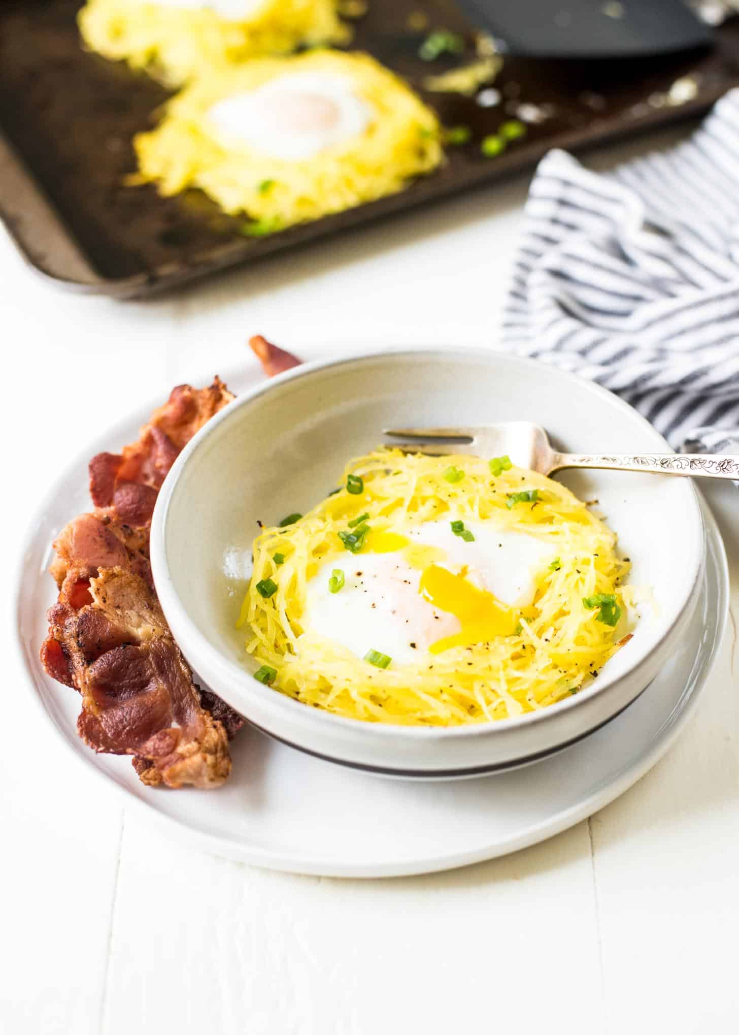 Spaghetti Squash Egg Nests in a white bowl