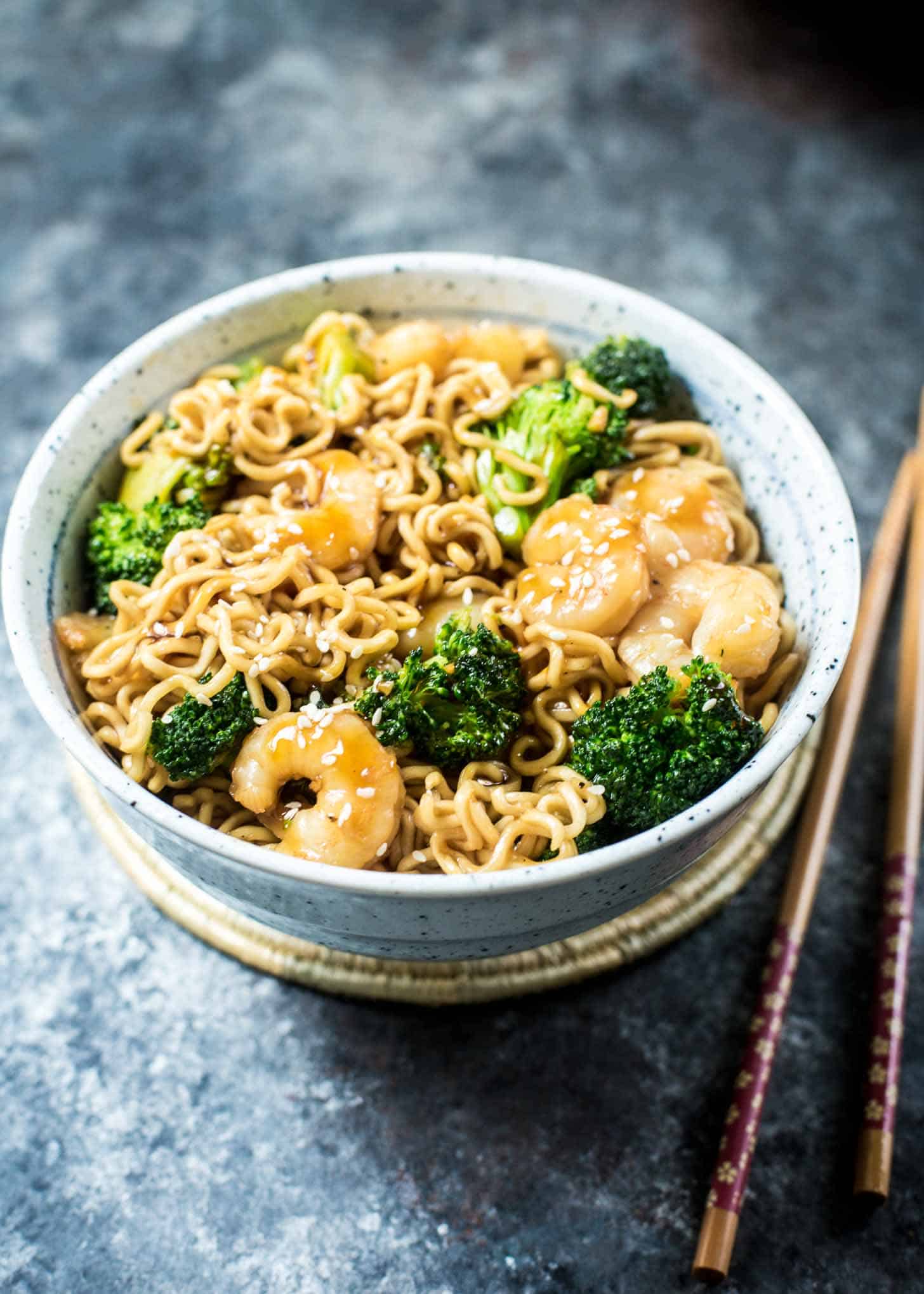 Shrimp Teriyaki Noodle Bowls with chopsticks on a grey table