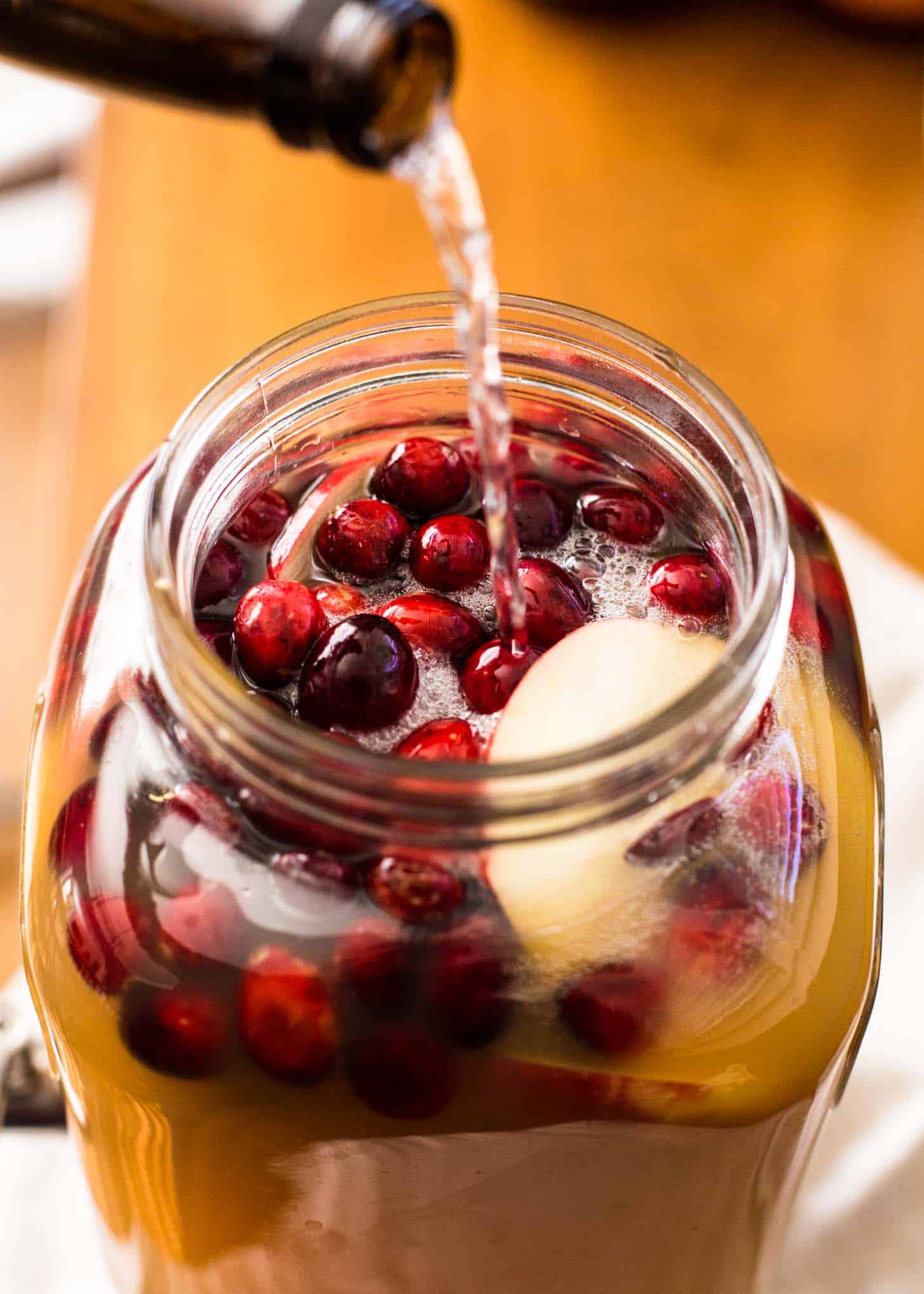 Pouring Apple Cider Punch with Bourbon