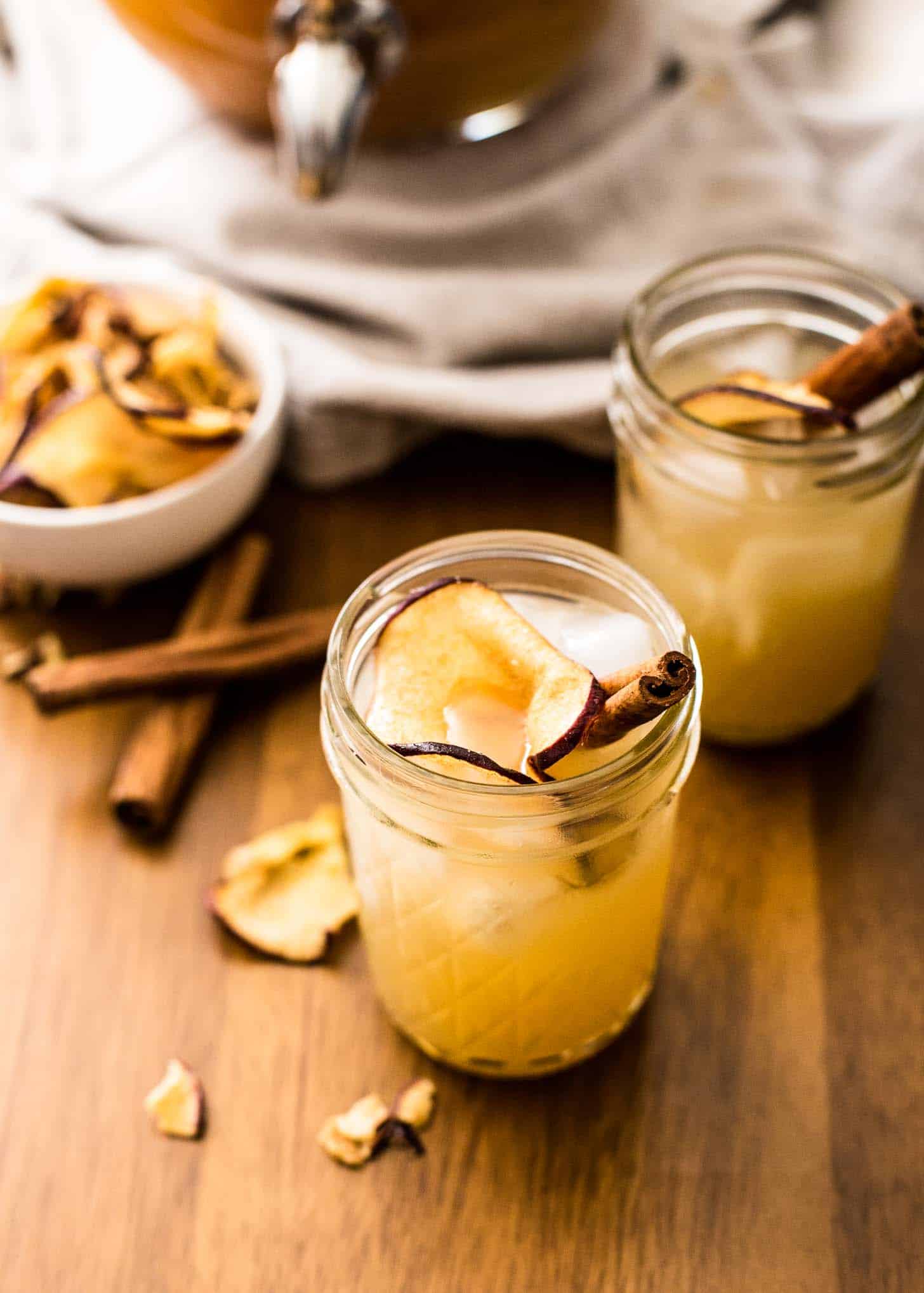 Apple Cider Punch with Bourbon in mason jars with cinnamon sticks
