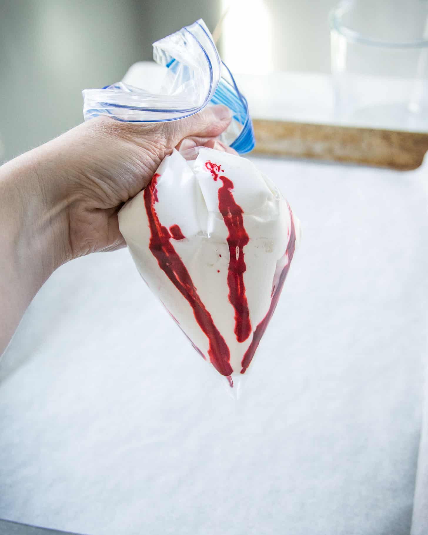  Candy Cane Meringues mixture in a piping bag