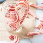 candy cane meringues in a glass jar
