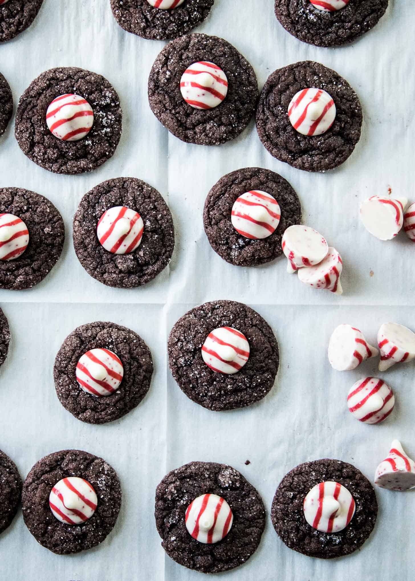 Chocolate Peppermint Blossoms on a parchment lined sheet pan