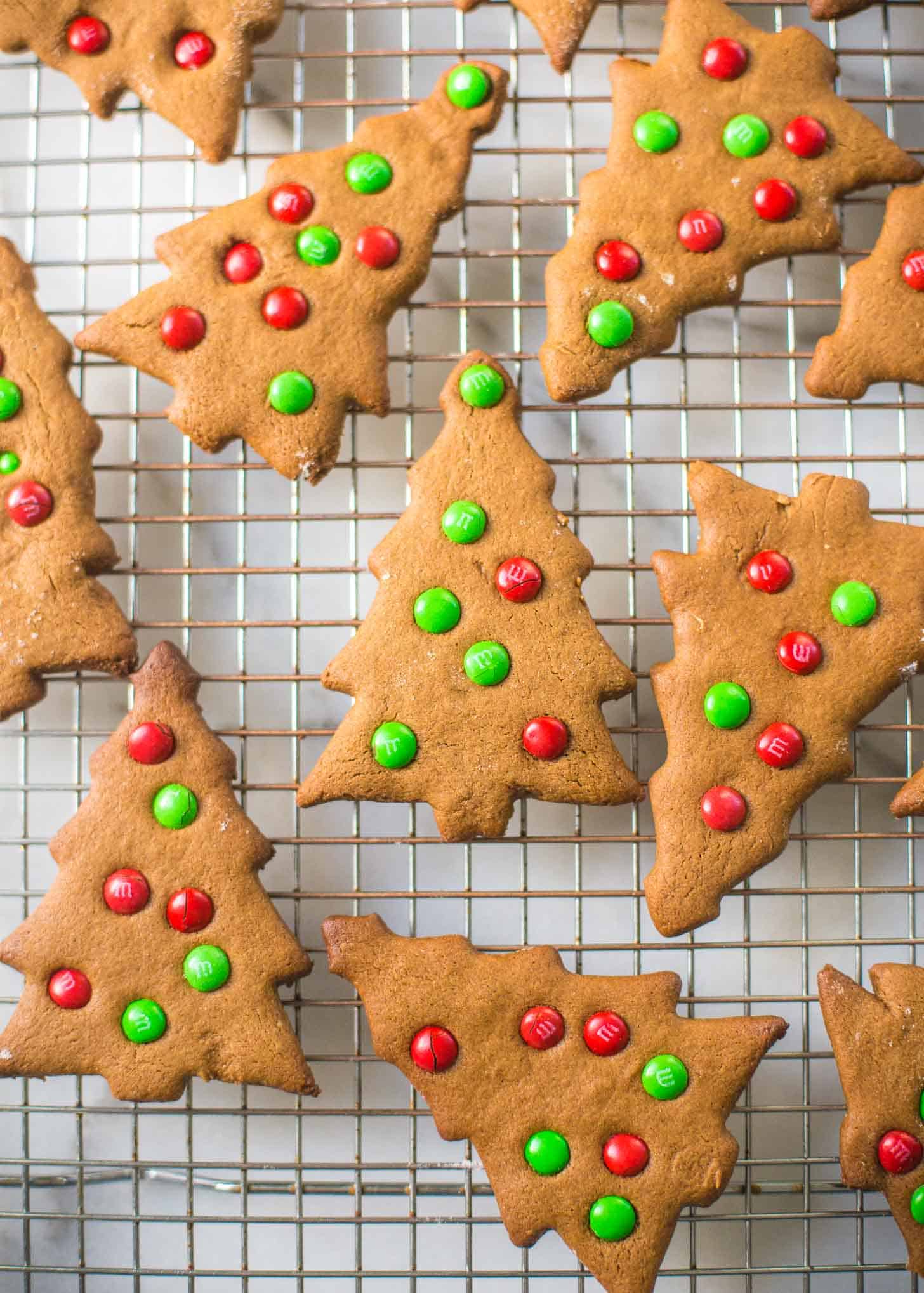 tree shaped Gingerbread Cookies on a cooling rack