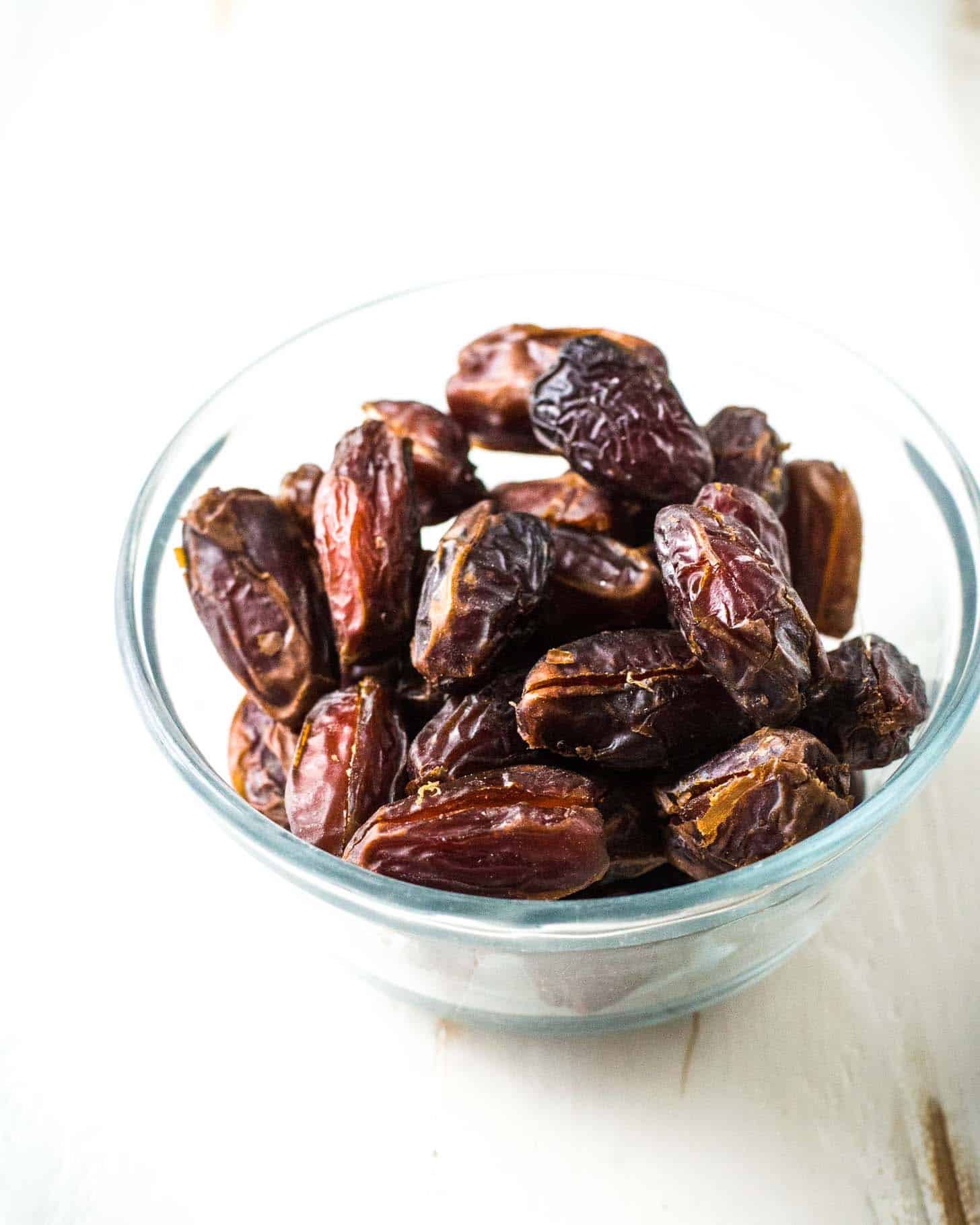 medjool dates in a clear bowl