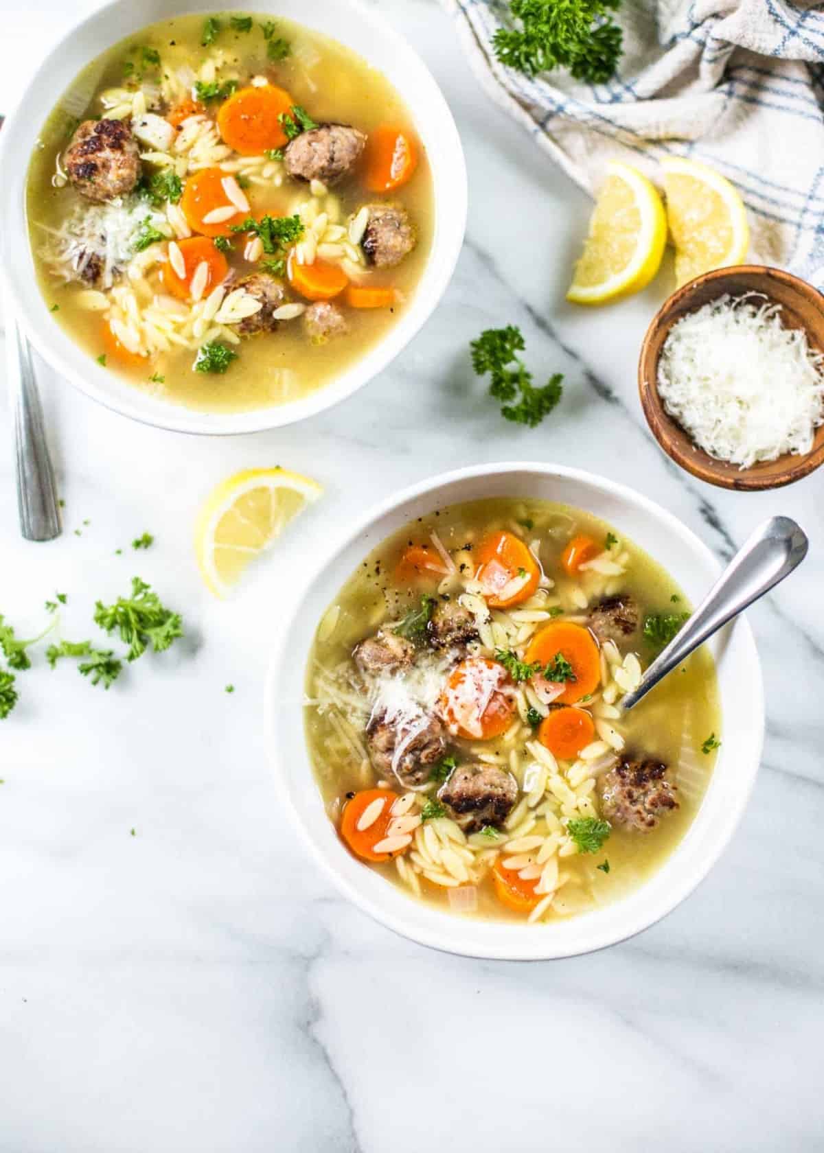 Mini Meatball and Orzo Soup in white bowls
