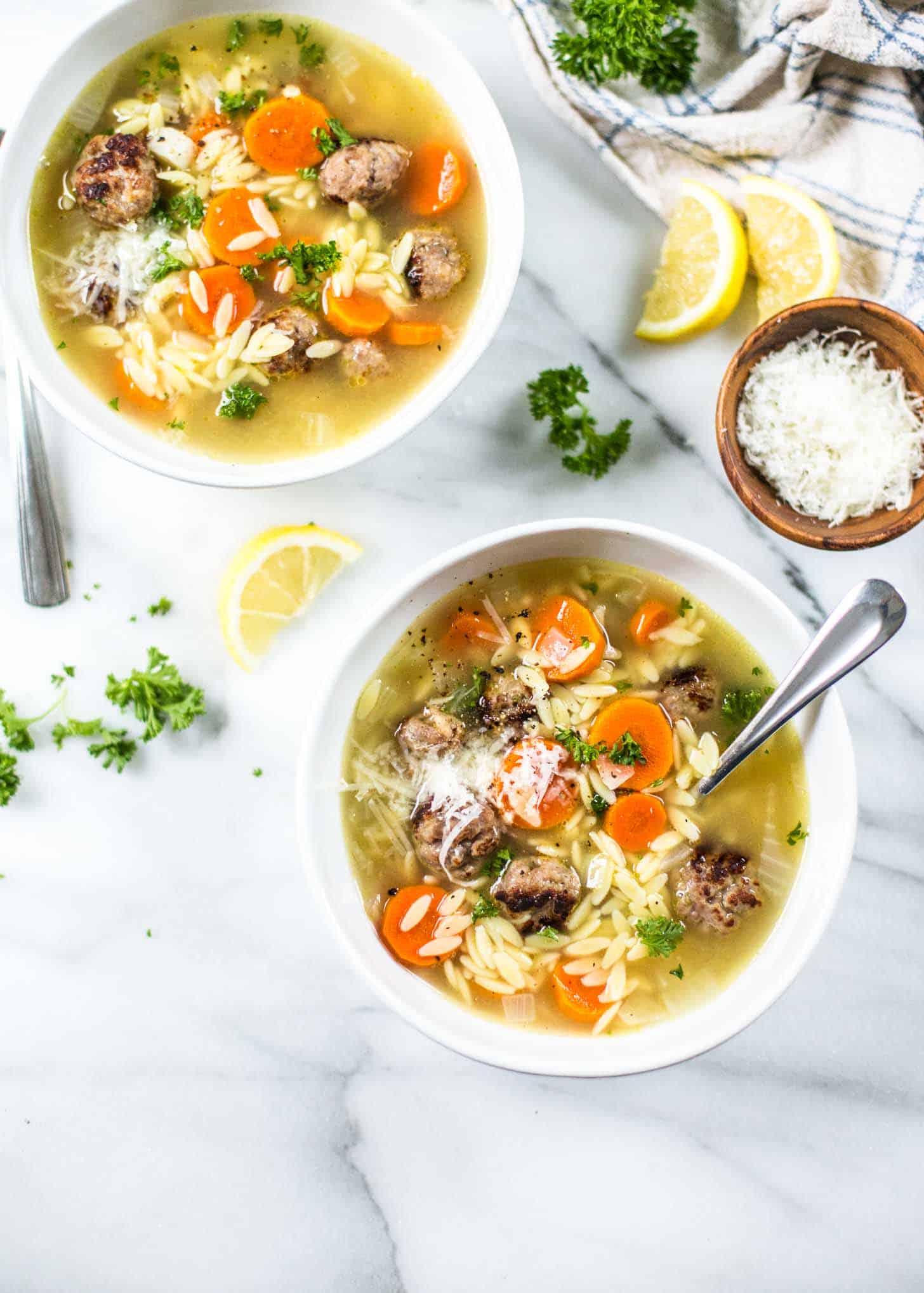 overhead image of Mini Italian Meatball and Orzo Soup in white bowls