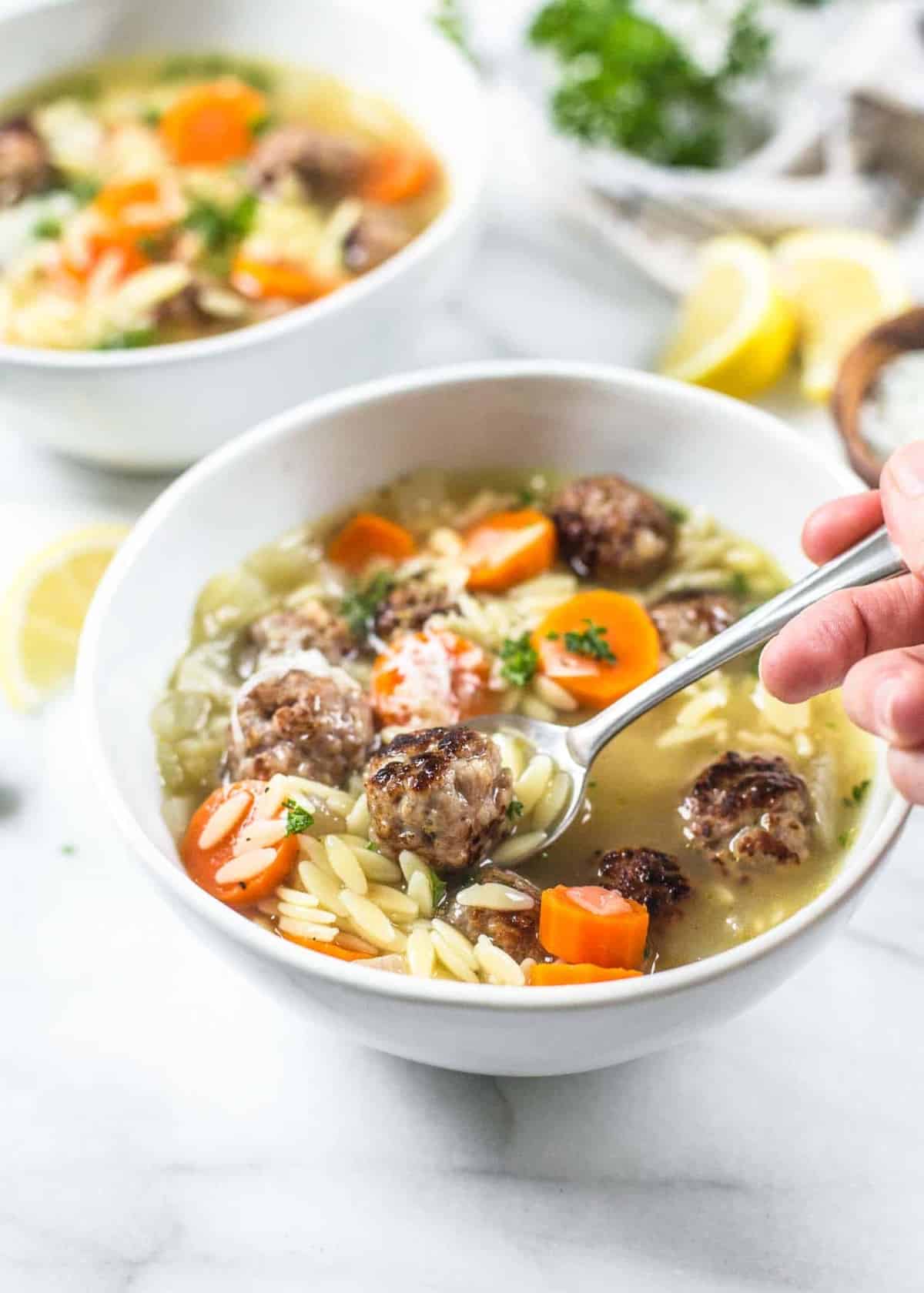 spooning Mini Meatball and Orzo Soup