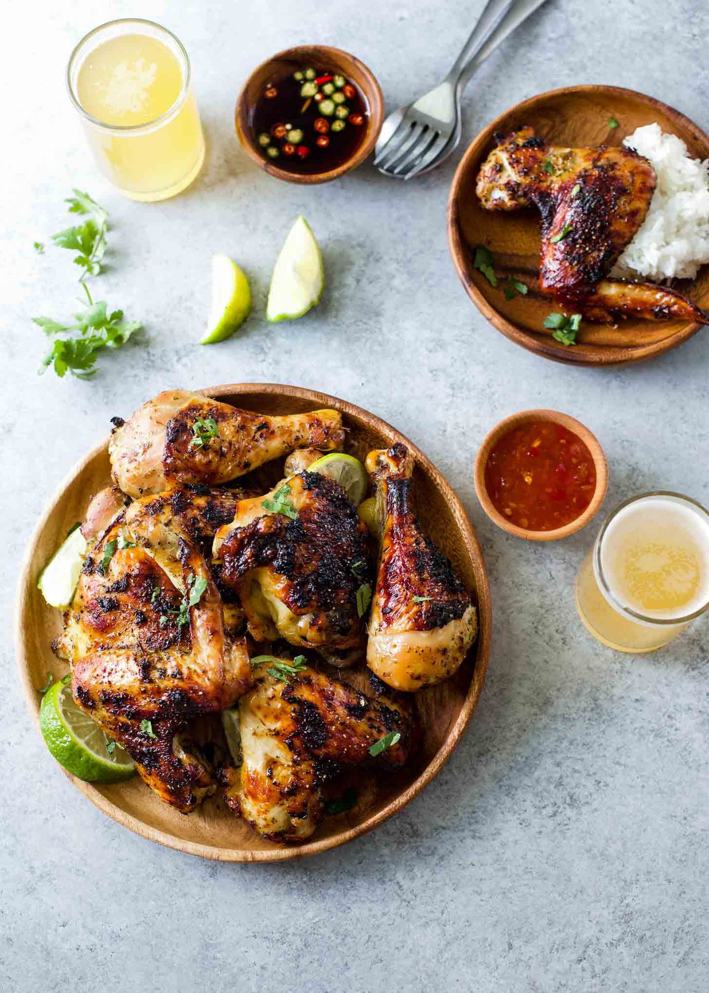 Thai Style Grilled Chicken on a wooden tray