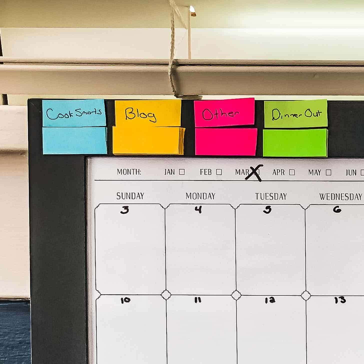 a calendar with multi-colored paper strips