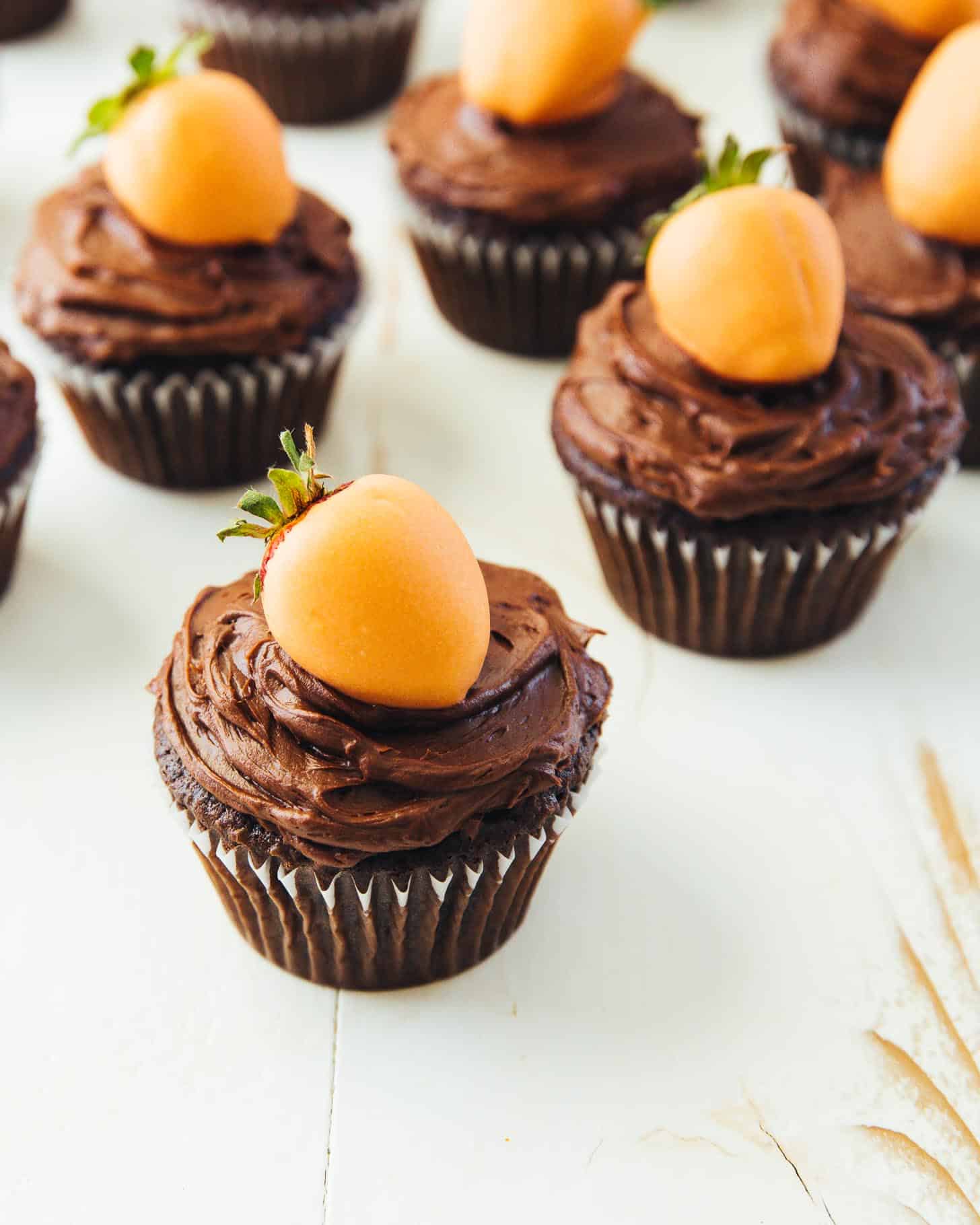 Carrot Top Chocolate Cupcakes on a white table