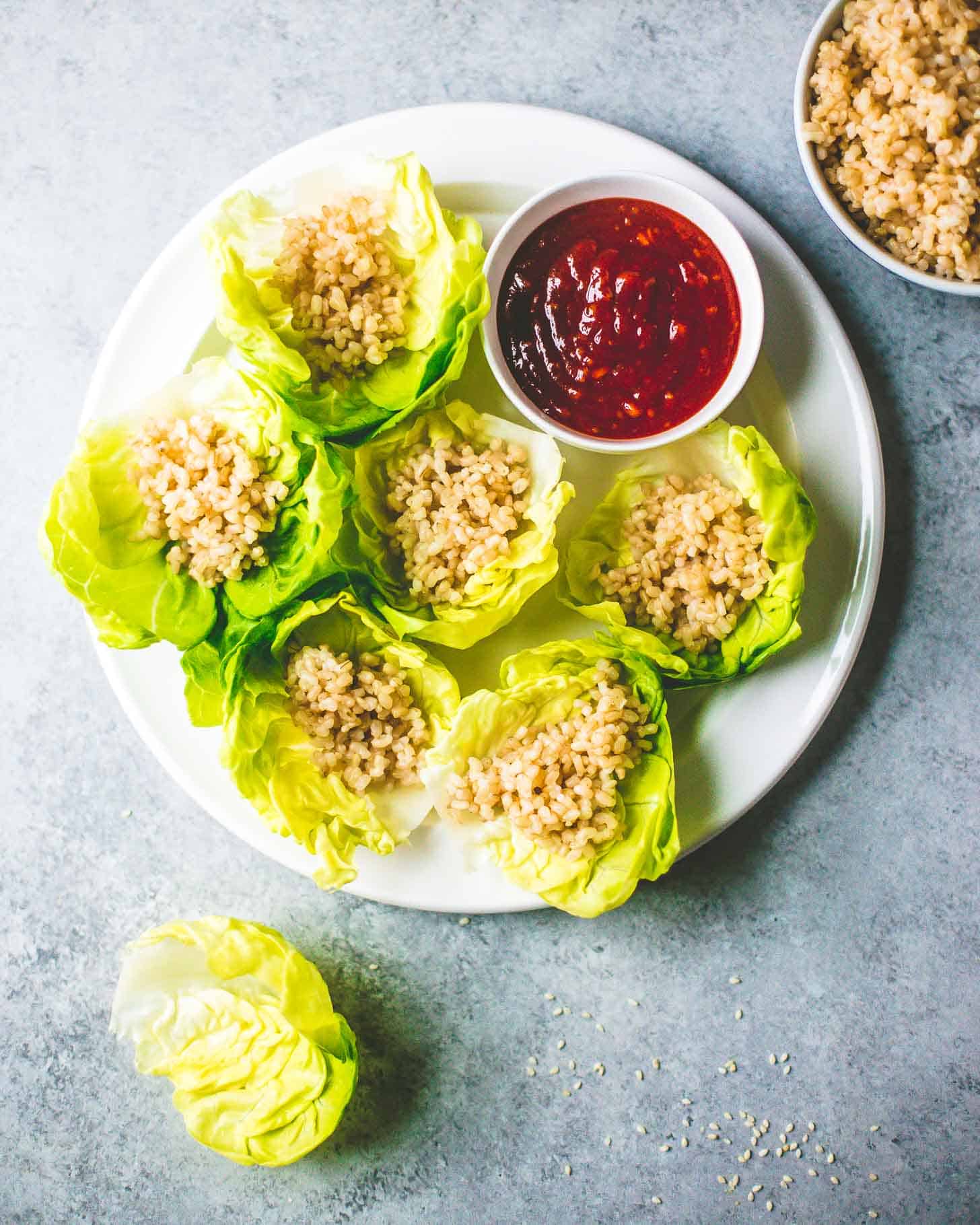 overhead image of Korean Chicken Lettuce Wraps on a white tray