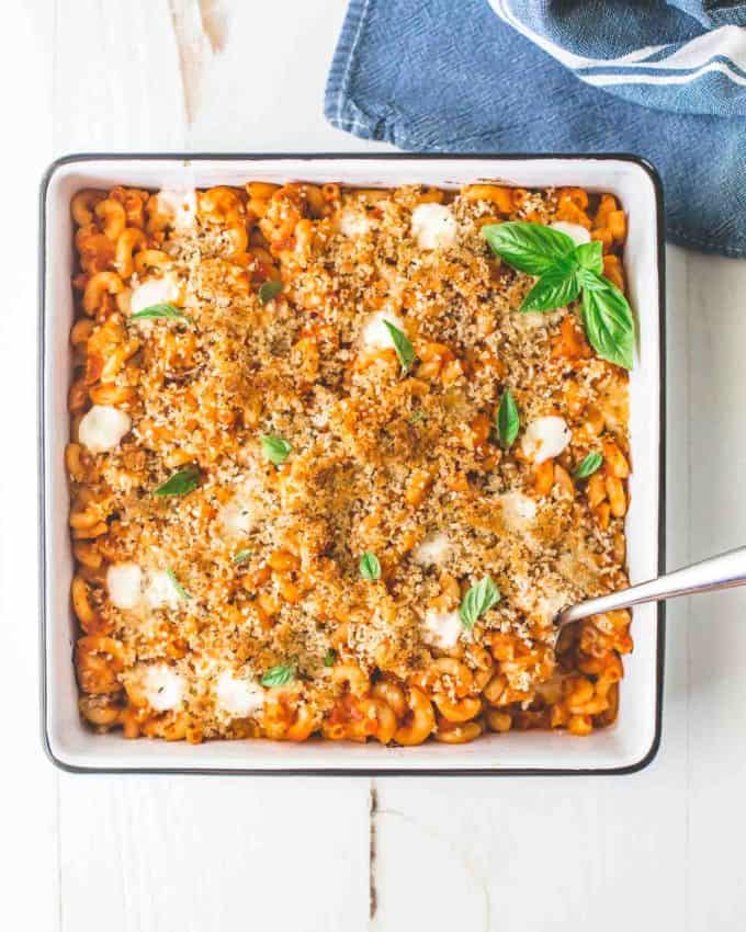 Chicken Parmesan Pasta Bake in a square baking dish
