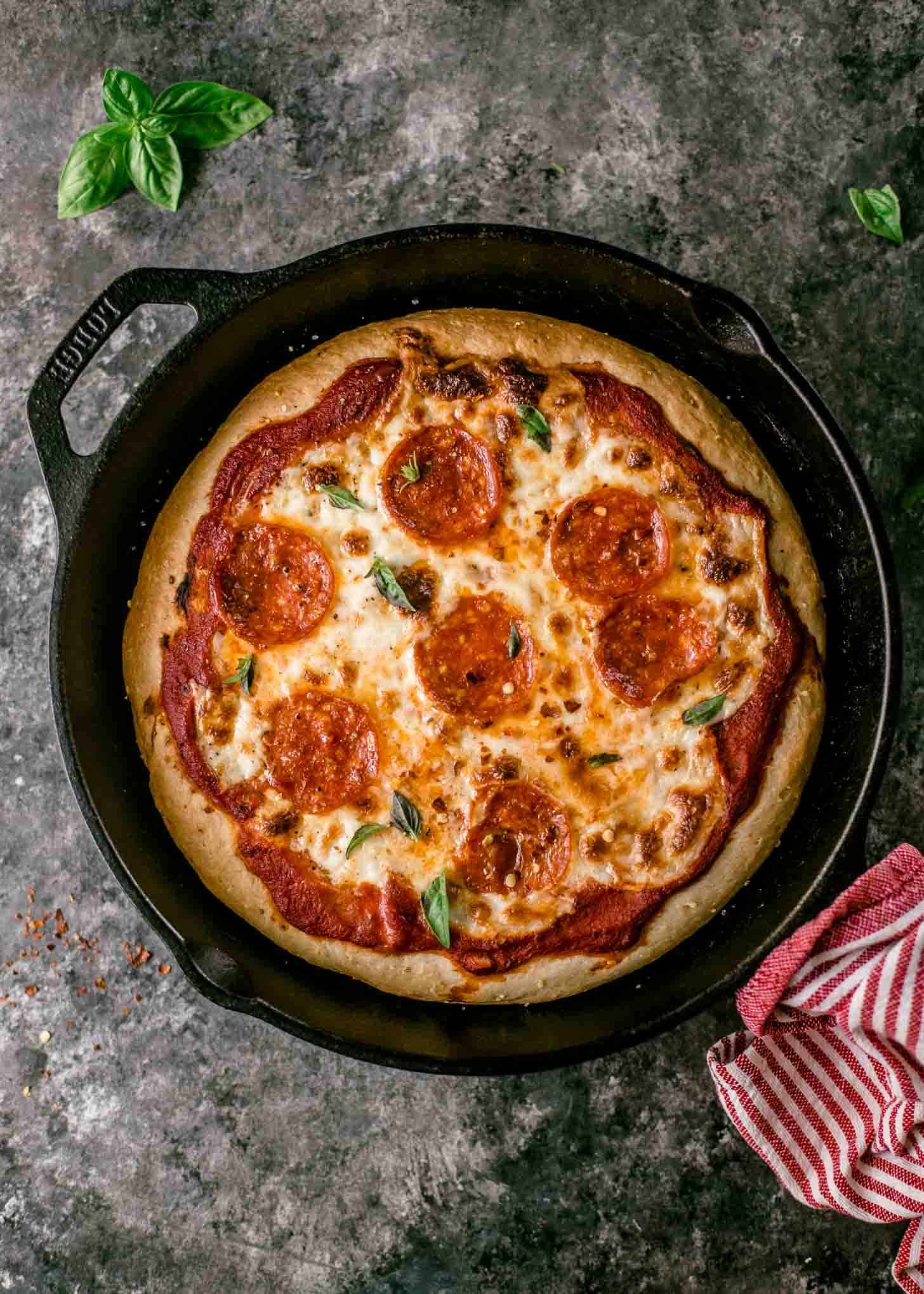 overhead image of Deep Dish Pizza in a cast iron skillet