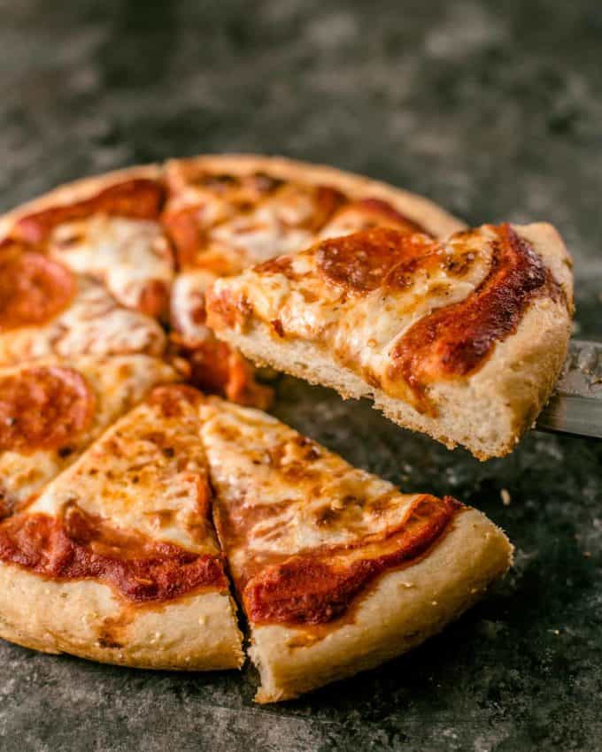 Deep Dish Pizza cut into slices