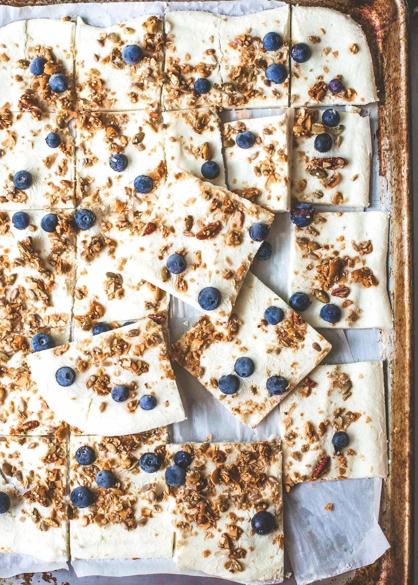 overhead image of Frozen Greek Yogurt Bark on a sheet pan