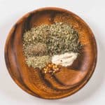 Italian Herb Seasoning in a small wooden bowl