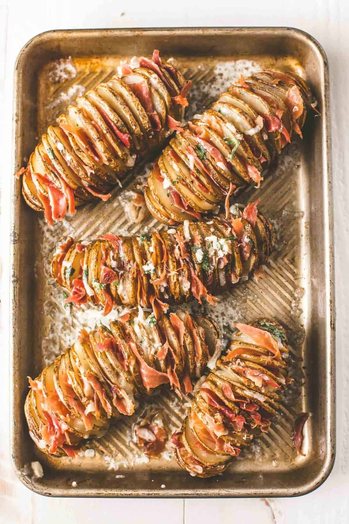 Ham and Cheese Hasselback Potatoes on a sheet pan