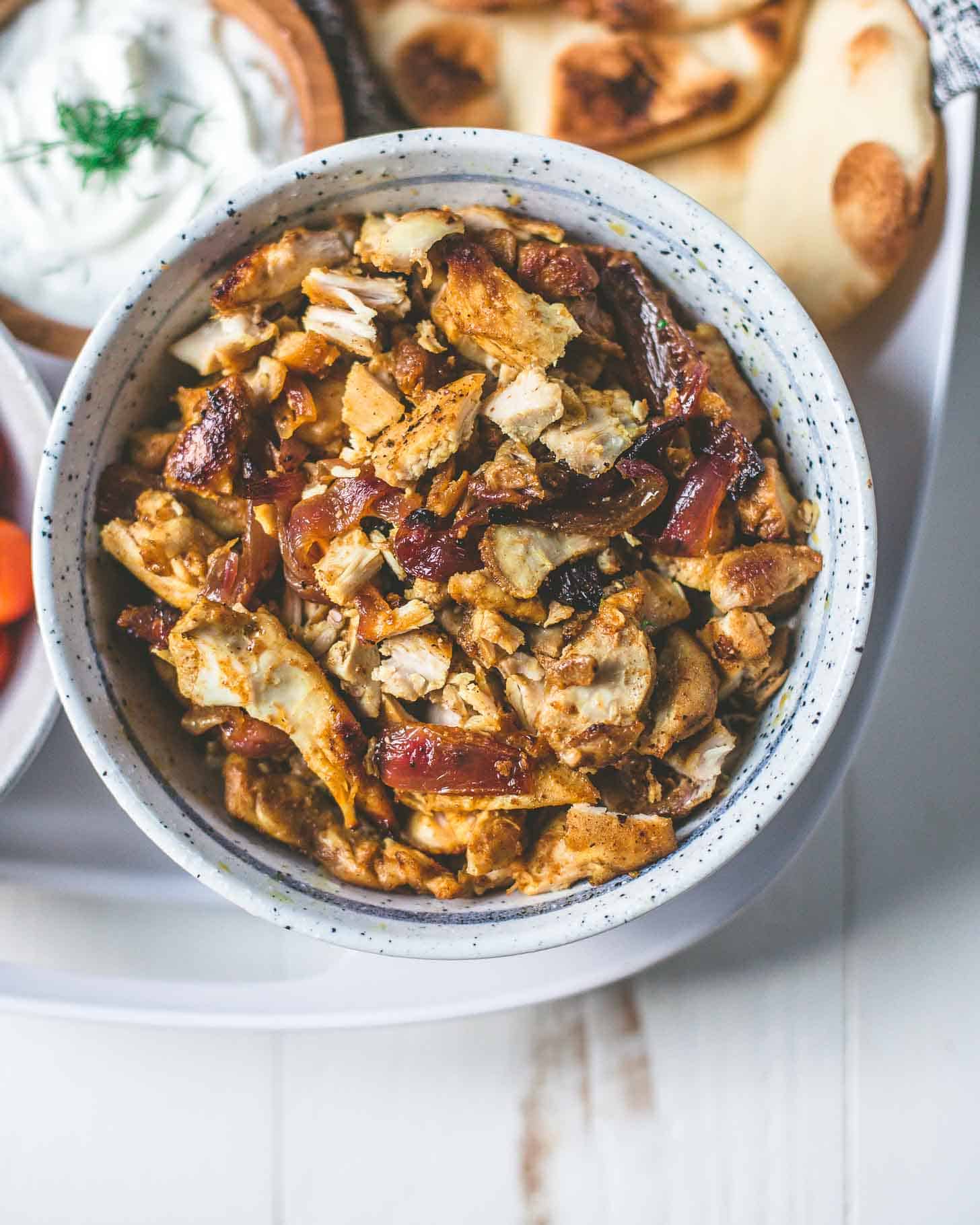 overhead image of Chicken Shawarma in a white bowl