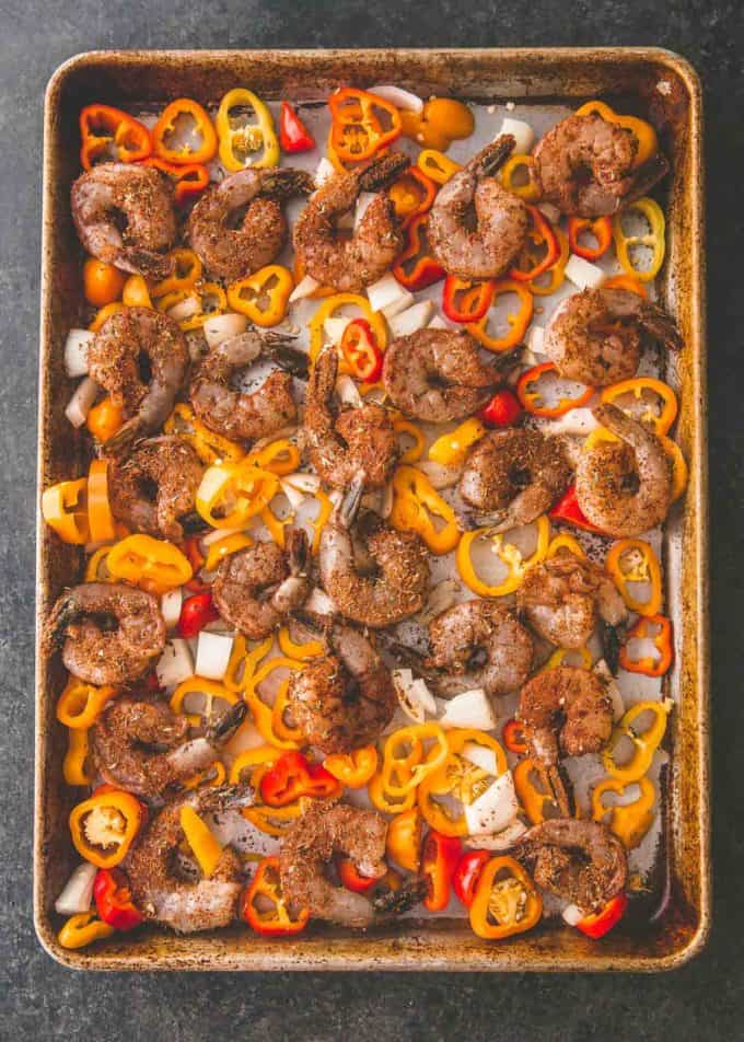 shrimp and peppers on a sheet pan