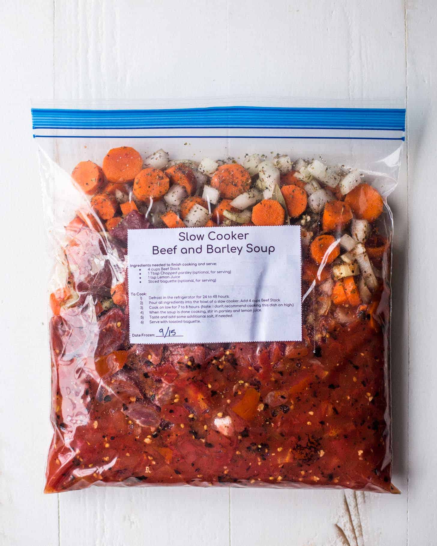 overhead image of the ingredients for Slow cooker beef and barley soup in a freezer bag