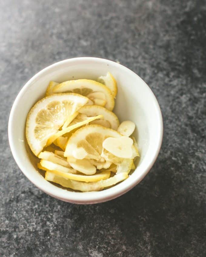 lemon slices in a small white bowl