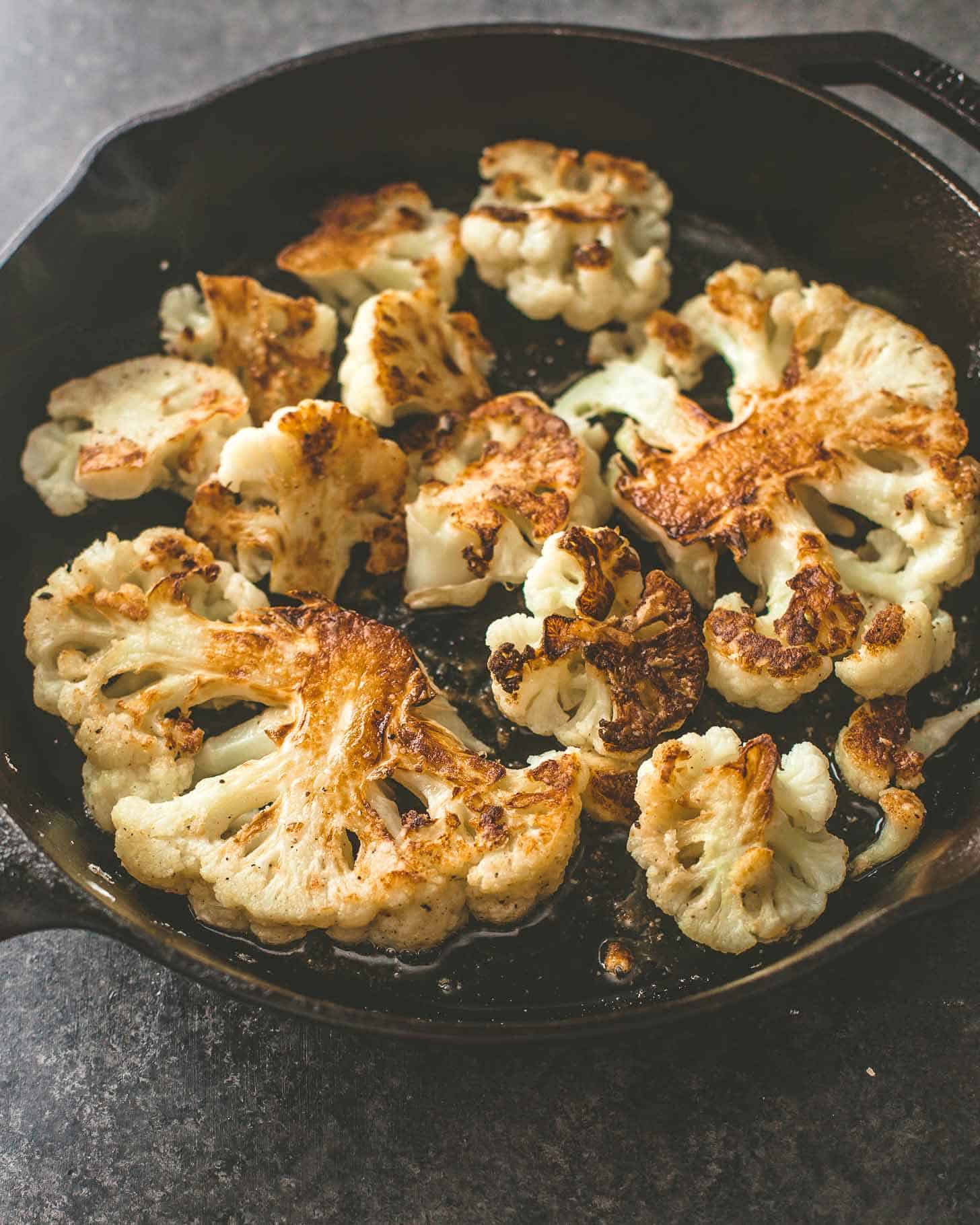 sauteed cauliflower in a cast iron skillet