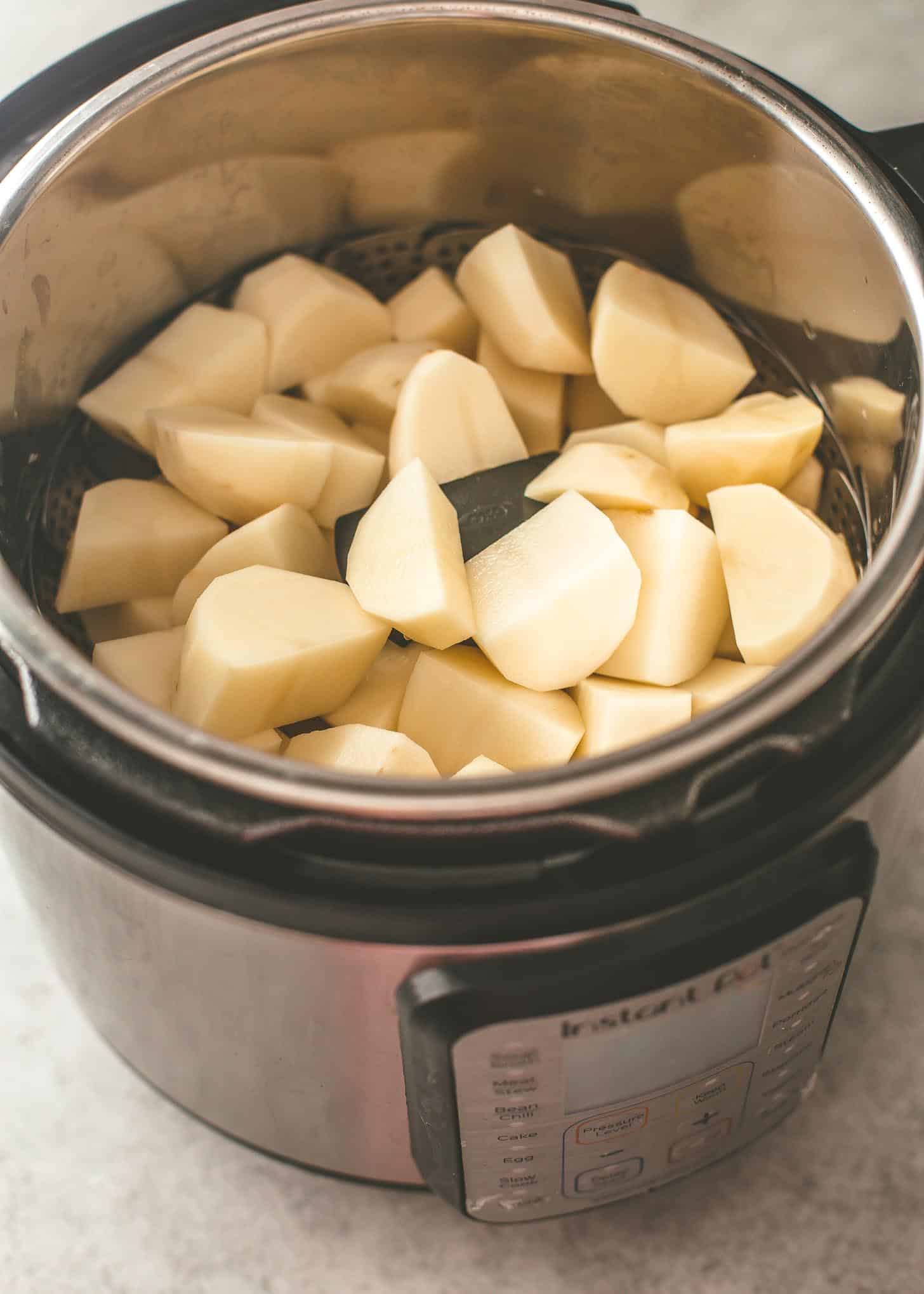 overhead image of raw cubed potatoes in the Instant Pot