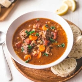 a bowl of beef and barley soup