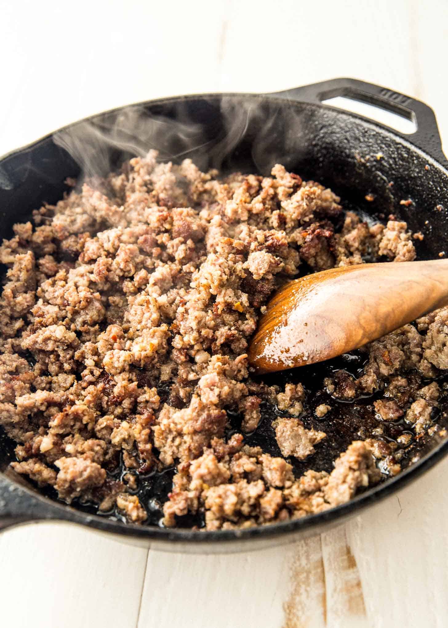 browning sausage in a skillet