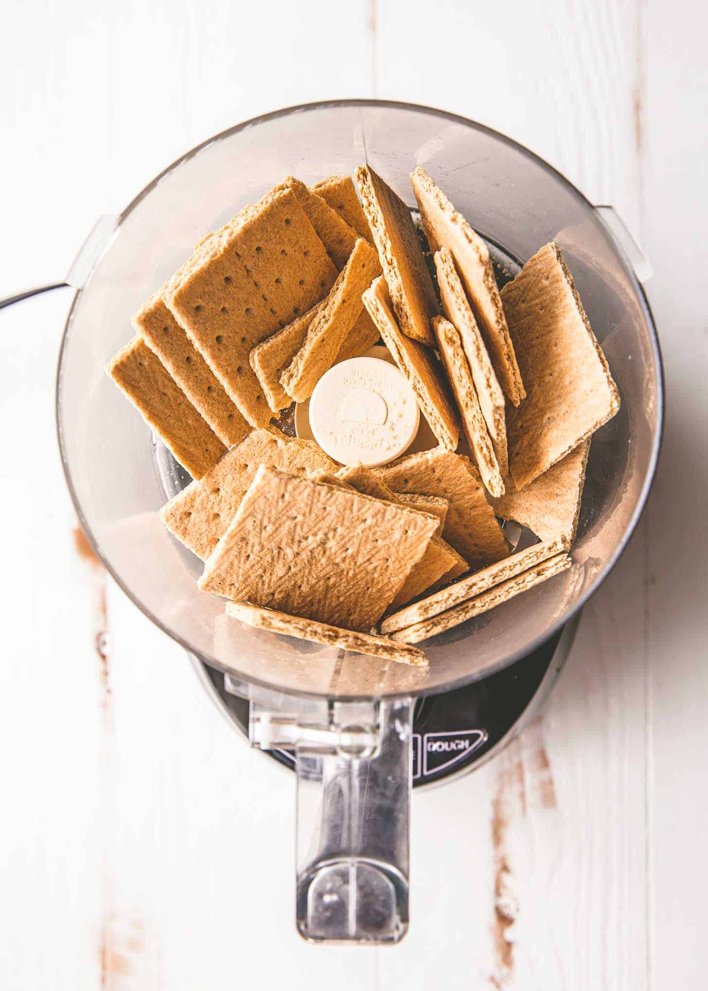 overhead image of graham crackers in a food processor