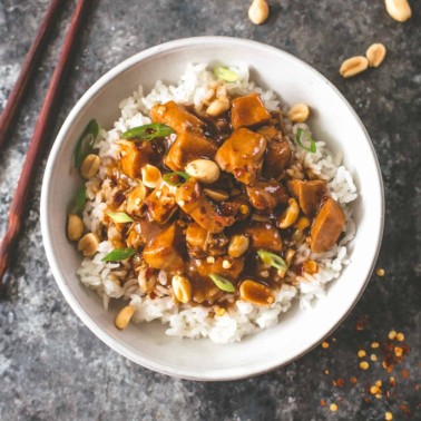 instant pot kung pao chicken over rice in a white bowl