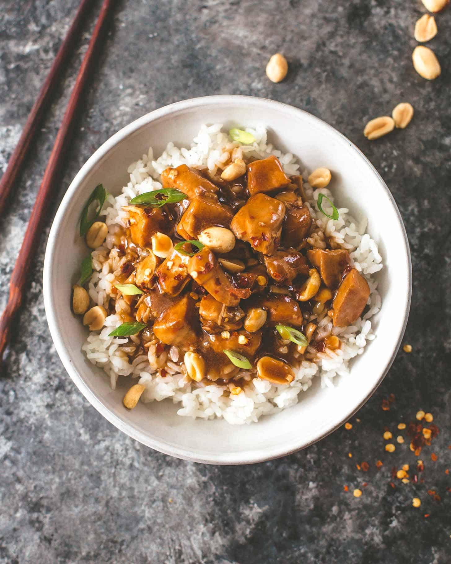 instant pot kung pao chicken over rice in a white bowl