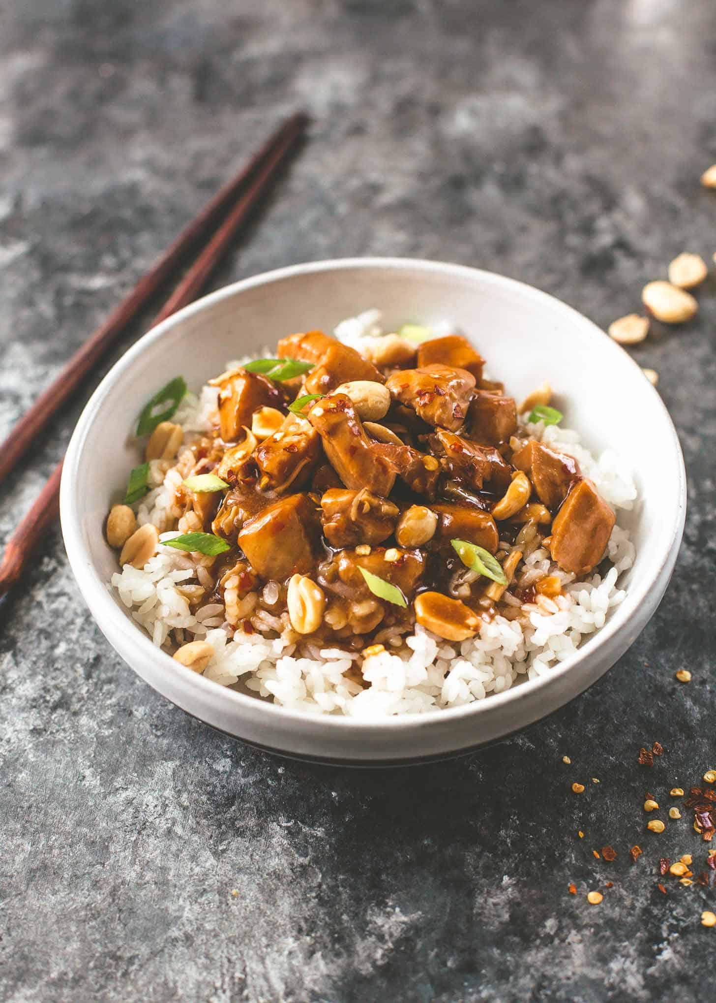 instant pot kung pao chicken over rice in a white bowl