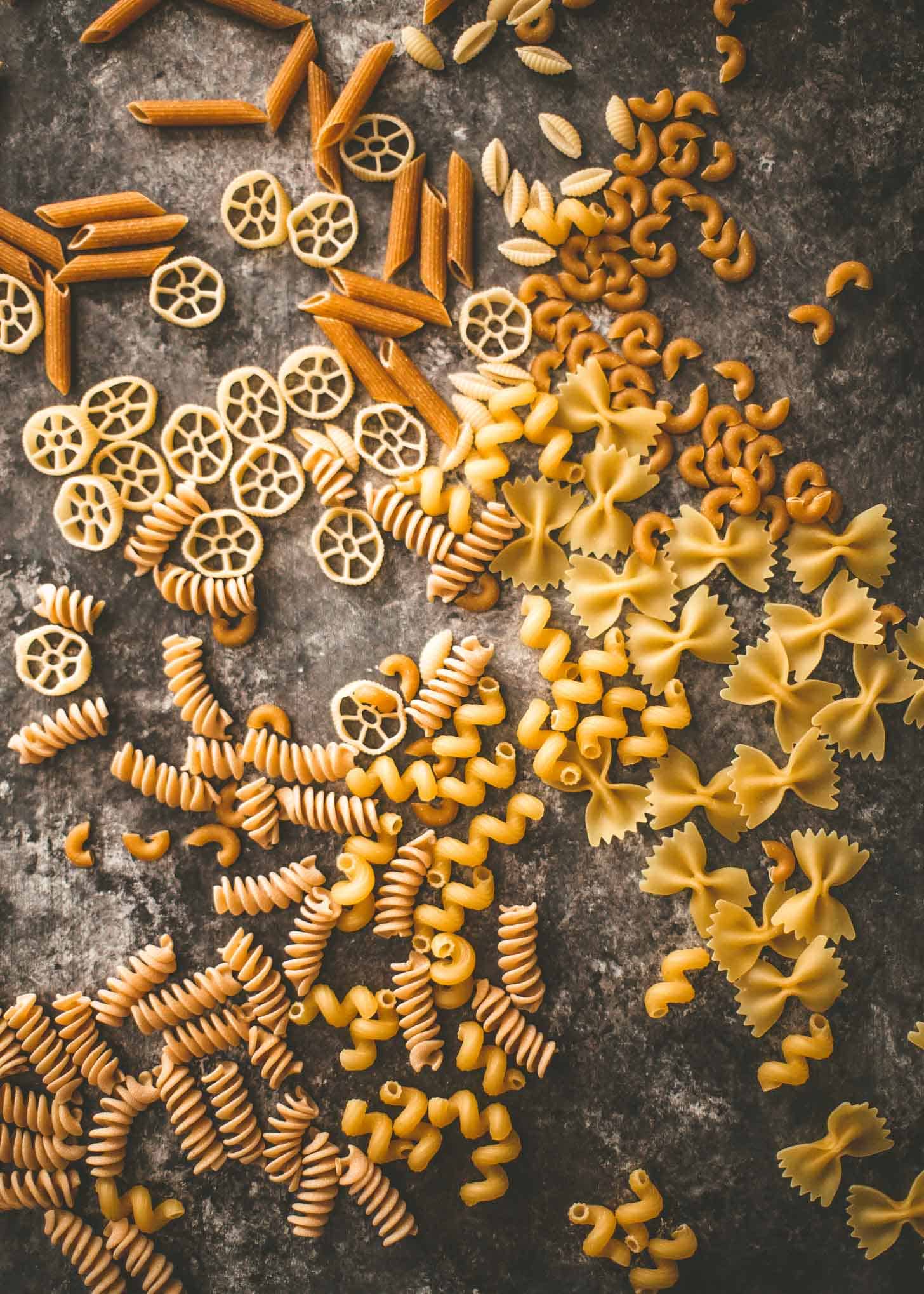 uncooked pasta on a grey countertop