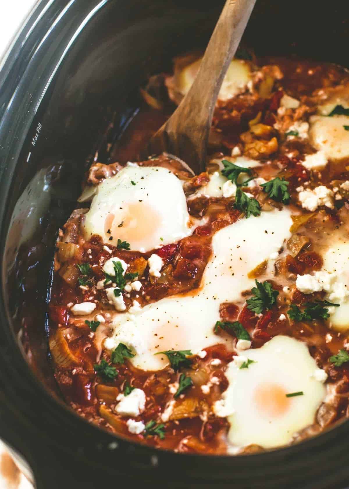 stirring slow cooker shakshuka