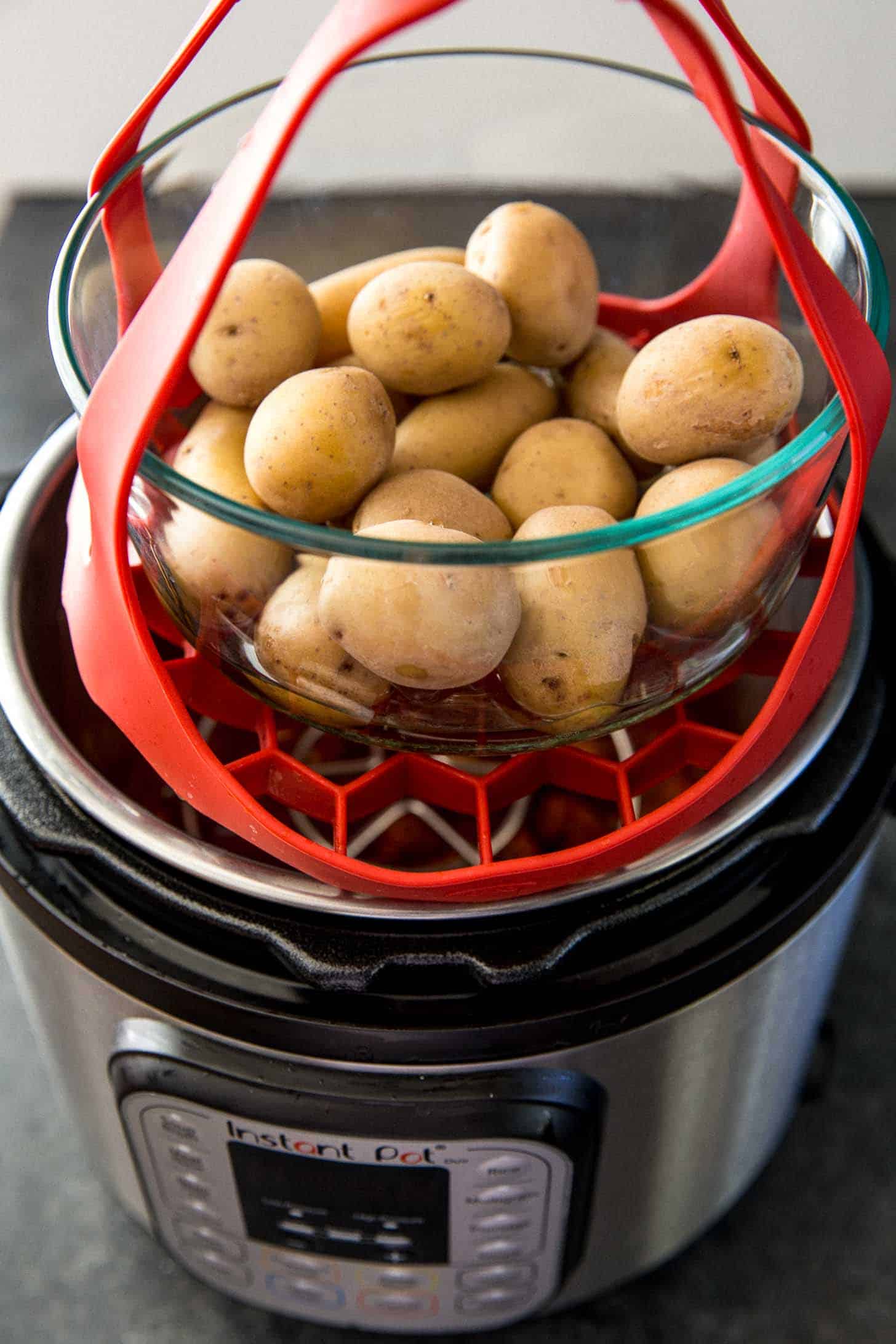 placing potatoes in an instant pot