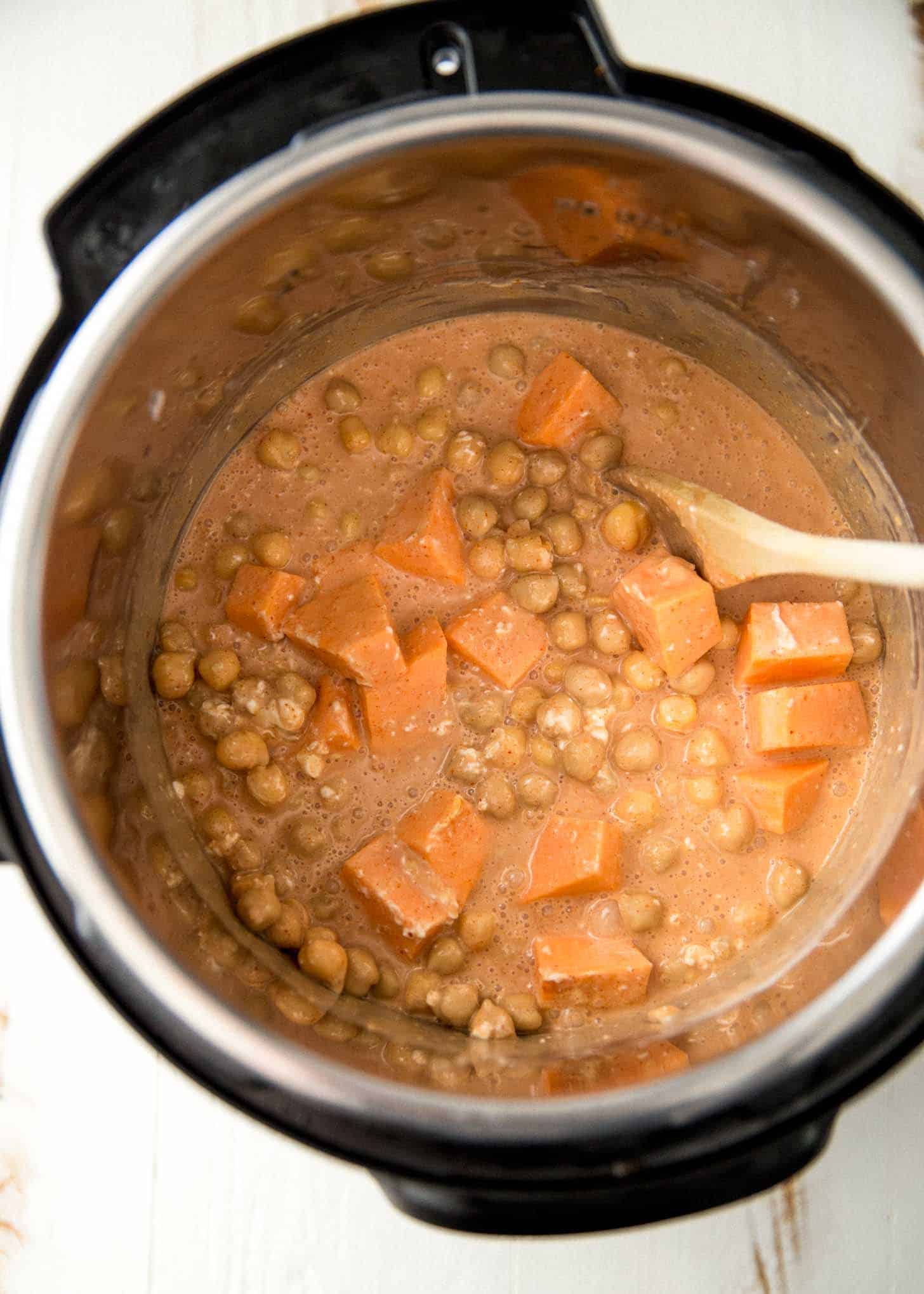 stirring thai panang curry in the instant pot