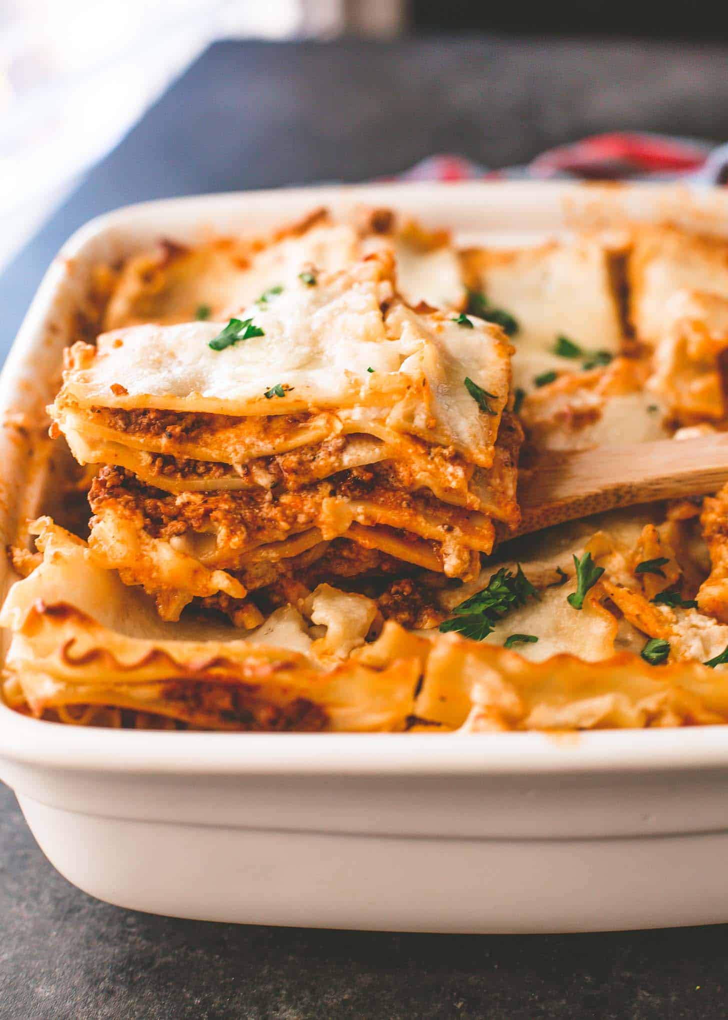 lasagna bolognese in a white dish