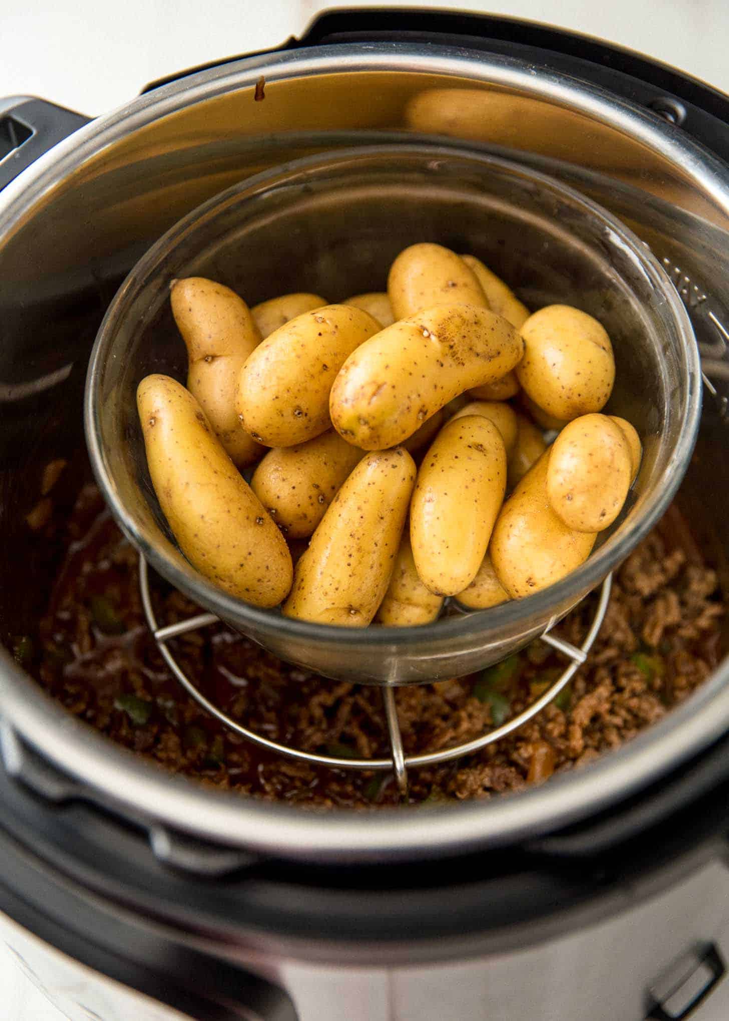 fingerling potatoes in a clear bowl in the instant pot