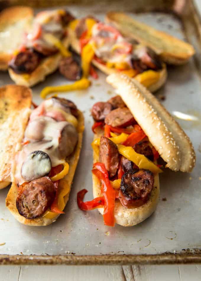 sheet pan sausage and peppers on buns