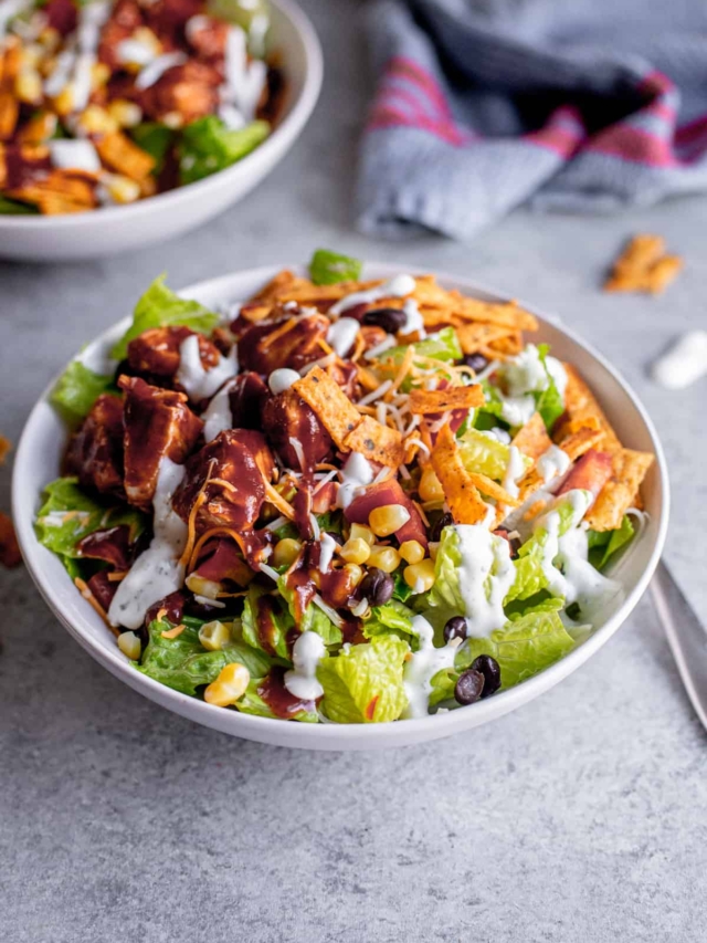 bbq chicken salad in a white bowl